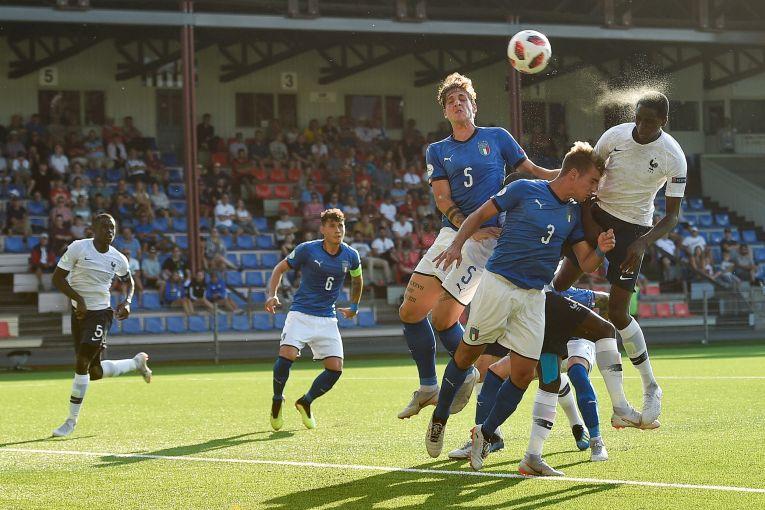Vaasa, FINLAND- July 26: Mahamadou Dembele of France and Nicolo\\' Zaniolo (l) and Alessandro Tripaldelli of Italy during their UEFA Under-19 Championship 2018 semi final match at Hietalahti stadium on July 26, 2018 in Vaasa, Finland. (Photo by Matt Browne - UEFA)