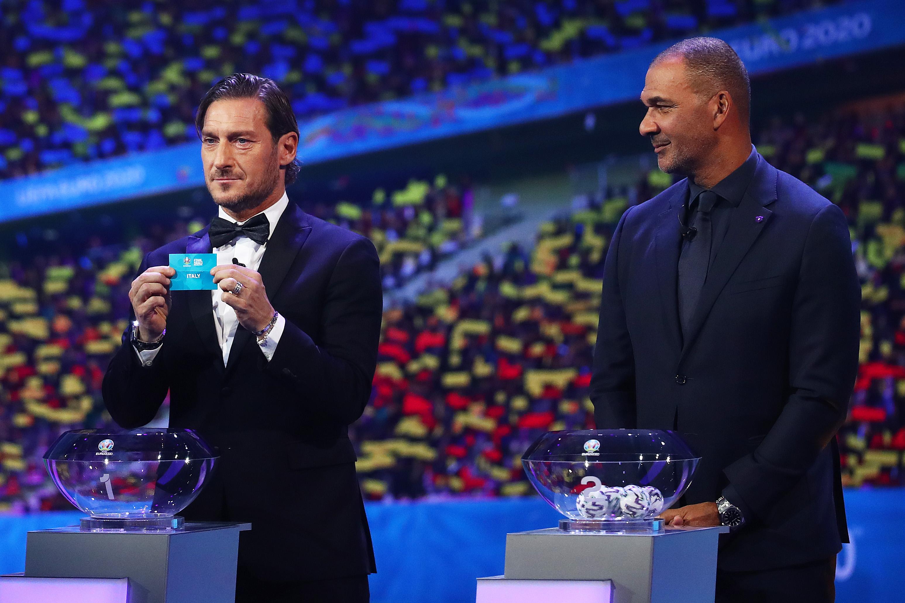 BUCHAREST, ROMANIA - NOVEMBER 30: Francesco Totti, Former Italy player draws Italy from the pot during the UEFA Euro 2020 Final Draw Ceremony at the Romexpo on November 30, 2019 in Bucharest, Romania. (Photo by Dean Mouhtaropoulos/Getty Images)