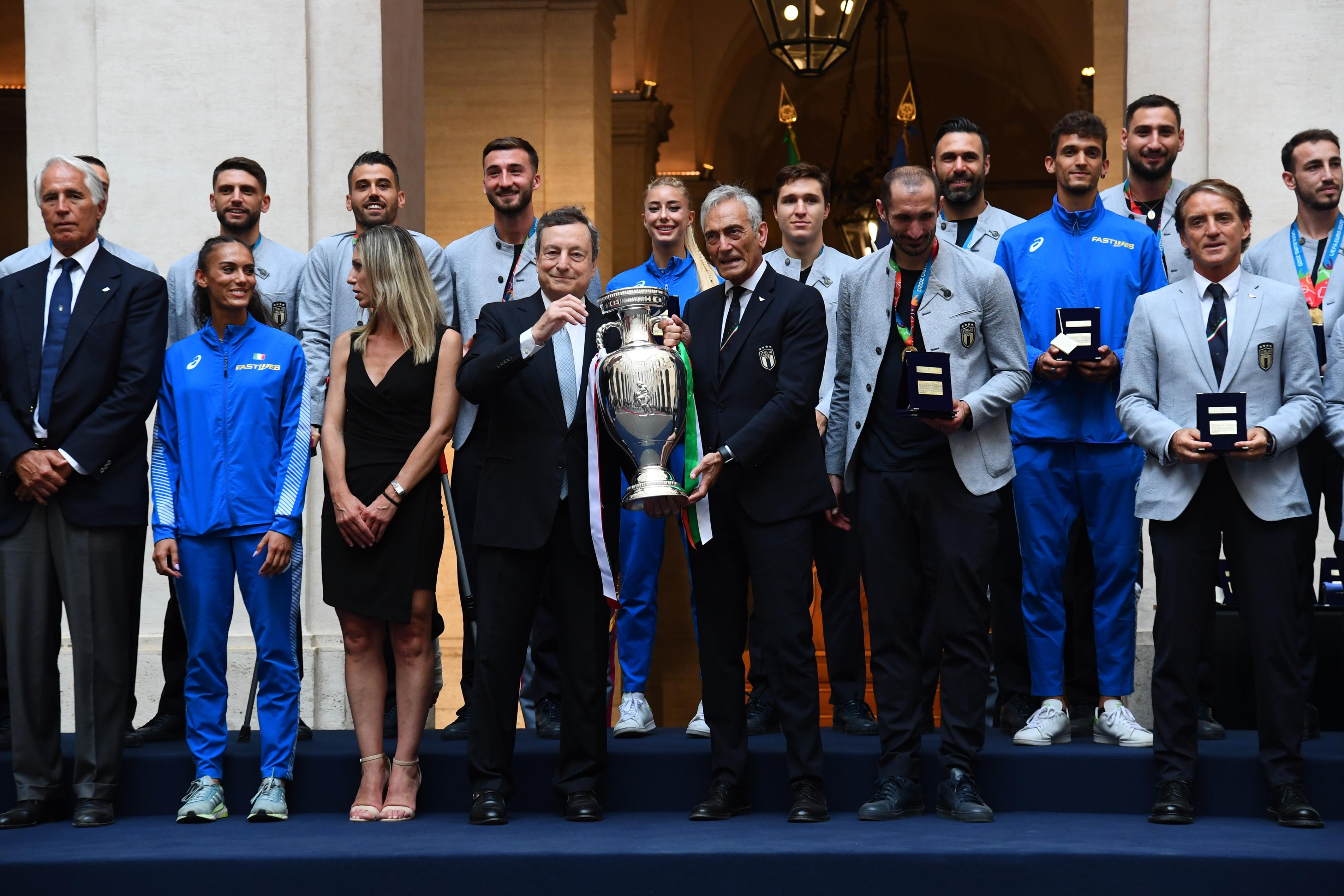 ROME, ITALY - JULY 12: Italy\\'s national men\\u00E2\\u20AC\\u2122s football team players pose for a photo during a meeting with Italian Prime Minister Mario Draghi on July 12, 2021 in Rome, Italy. (Photo by Claudio Villa/Getty Images)