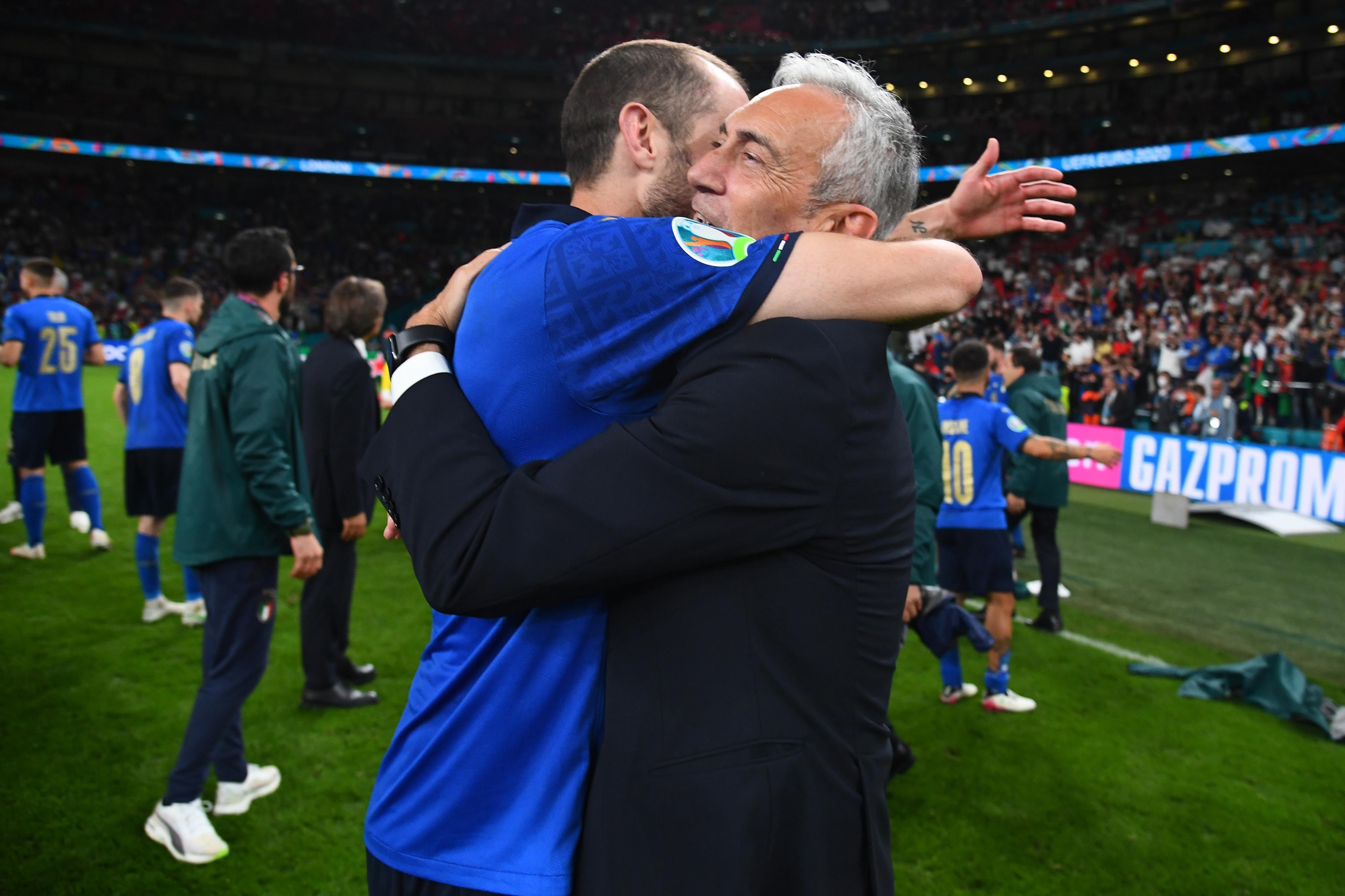 LONDON, ENGLAND - JULY 11: Leonardo Bonucci of Italy interacts with Gabriele Gravina, Italian Football Federation President following their team's victory in the UEFA Euro 2020 Championship Final between Italy and England at Wembley Stadium on July 11, 2021 in London, England. (Photo by Claudio Villa/Getty Images)