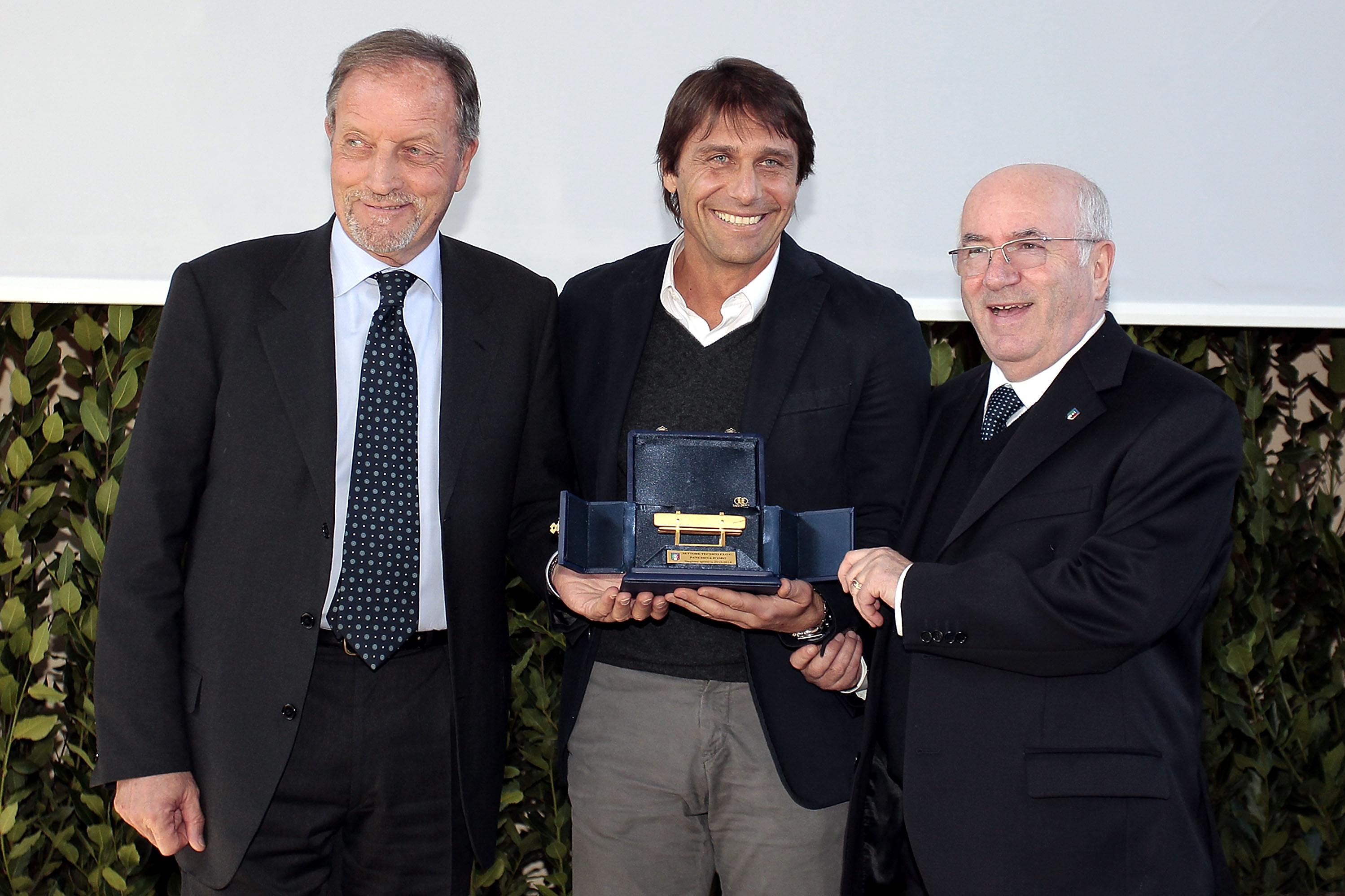 FLORENCE, ITALY - MARCH 09: Renzo Ulivieri President National Association coaches (L) , Antonio Conte manager of Itlay (C) and Carlo Tavecchio president of FIGC during the \"Panchina D\\'oro season 2013-2014 on March 9, 2015 in Florence, Italy. (Photo by Gabriele Maltinti/Getty Images)