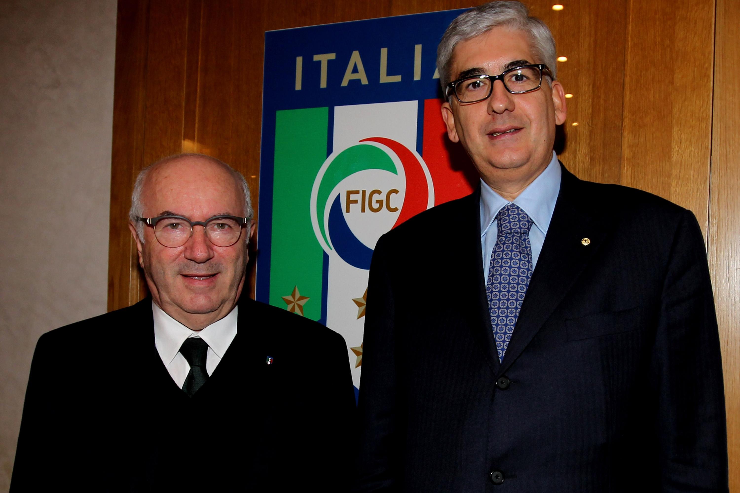 ROME, ITALY - DECEMBER 17: (L-R) Italian Football Federation President Carlo Tavecchio and Youth department President Vito Roberto Tisci pose after the press conference on December 17, 2014 in Rome, Italy.  (Photo by Paolo Bruno/Getty Images) *** Local Caption *** Carlo Tavecchio; Vito Roberto Tisci