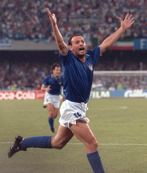 Italian forward Salvatore Schillaci exults after scoring his team's first goal during the World Cup semifinal soccer match between Italy and Argentina 03 July 1990 in Naples. Argentina and Italy played to a 1-1 tie but Argentina advanced to the finals with a 4-3 victory on penalty kicks dashing the hopes of Italian fans of a World Cup victory by their team on home soil. AFP PHOTO/DANIEL GARCIA / AFP PHOTO / DANIEL GARCIA (Photo credit should read DANIEL GARCIA/AFP via Getty Images)