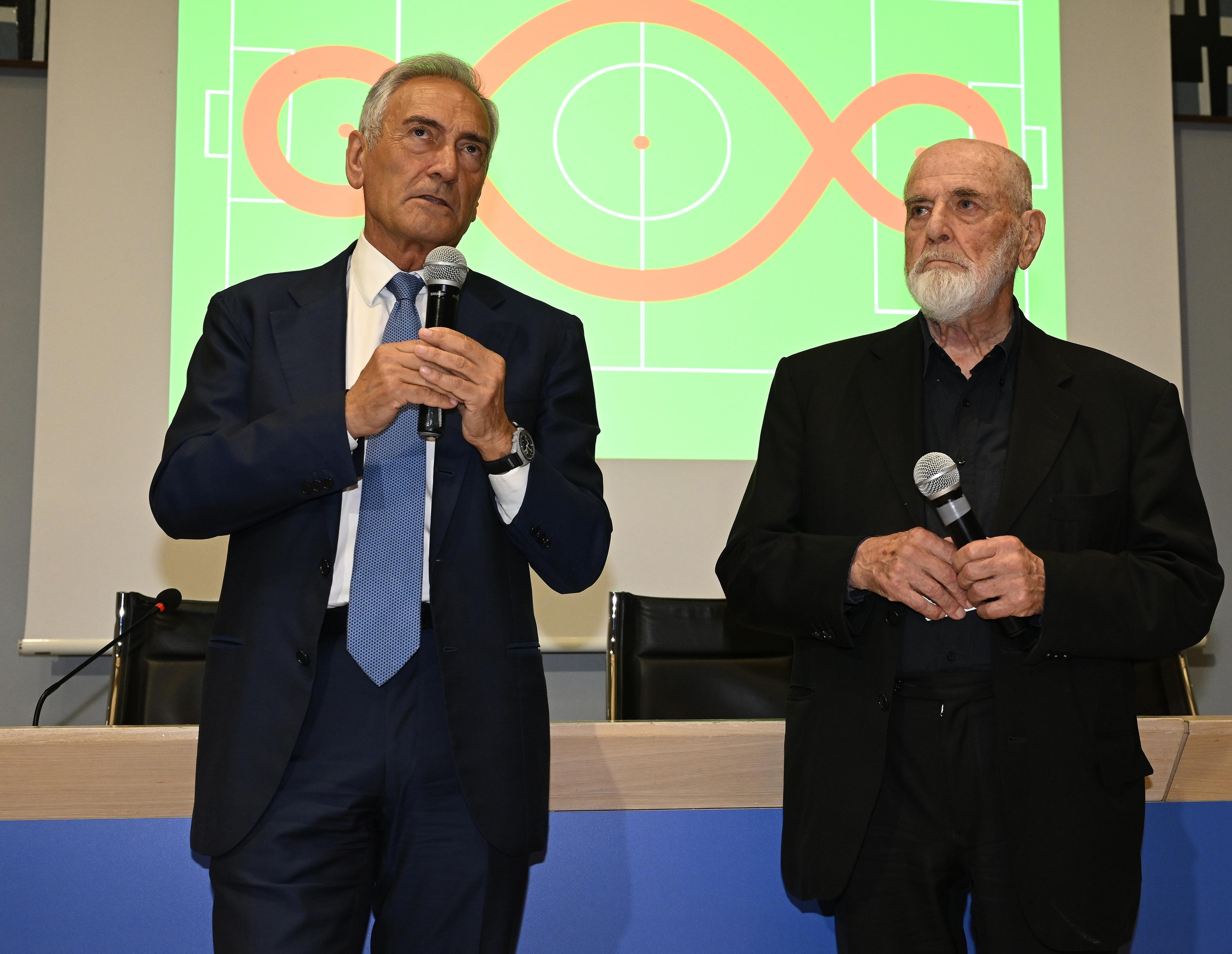 FLORENCE, ITALY - JUNE 12: Italian painter, sculptor and artist Michelangelo Pistoletto and FIGC President Gabriele Gravina speak during FIGC 'Arte e Calcio: contaminiaAMOci' Event on June 12, 2023 in Florence, Italy. (Photo by Claudio Villa/Getty Images)