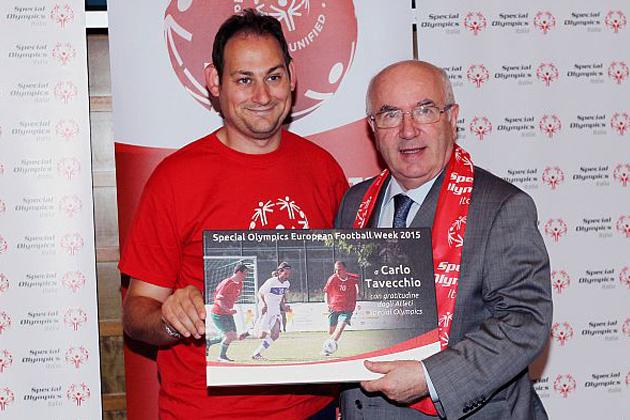 ROME, ITALY - MAY 13: Italian Football Federation President Carlo Tavecchio (R) and Italian player pose during the Special Olympic press conference on May 13, 2015 in Rome, Italy. (Photo by Paolo Bruno/Getty Images)