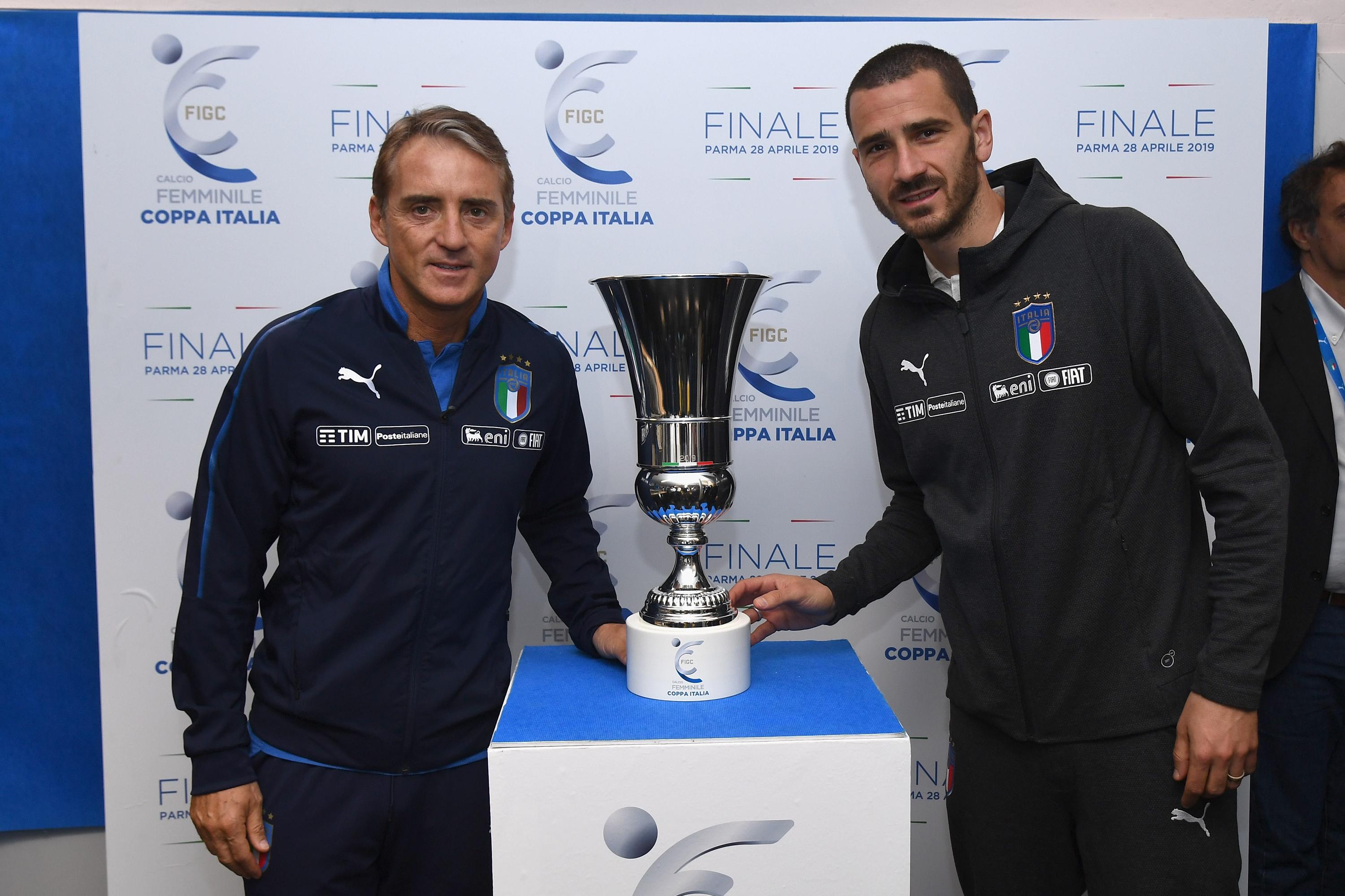 PARMA, ITALY - MARCH 25:  Head coach Italy Roberto Mancini (L) and Leonardo Bonucci of Italy pose for a photo during a press conference at Ennio Tardini on March 25, 2019 in Parma, Italy.  (Photo by Claudio Villa/Getty Images)