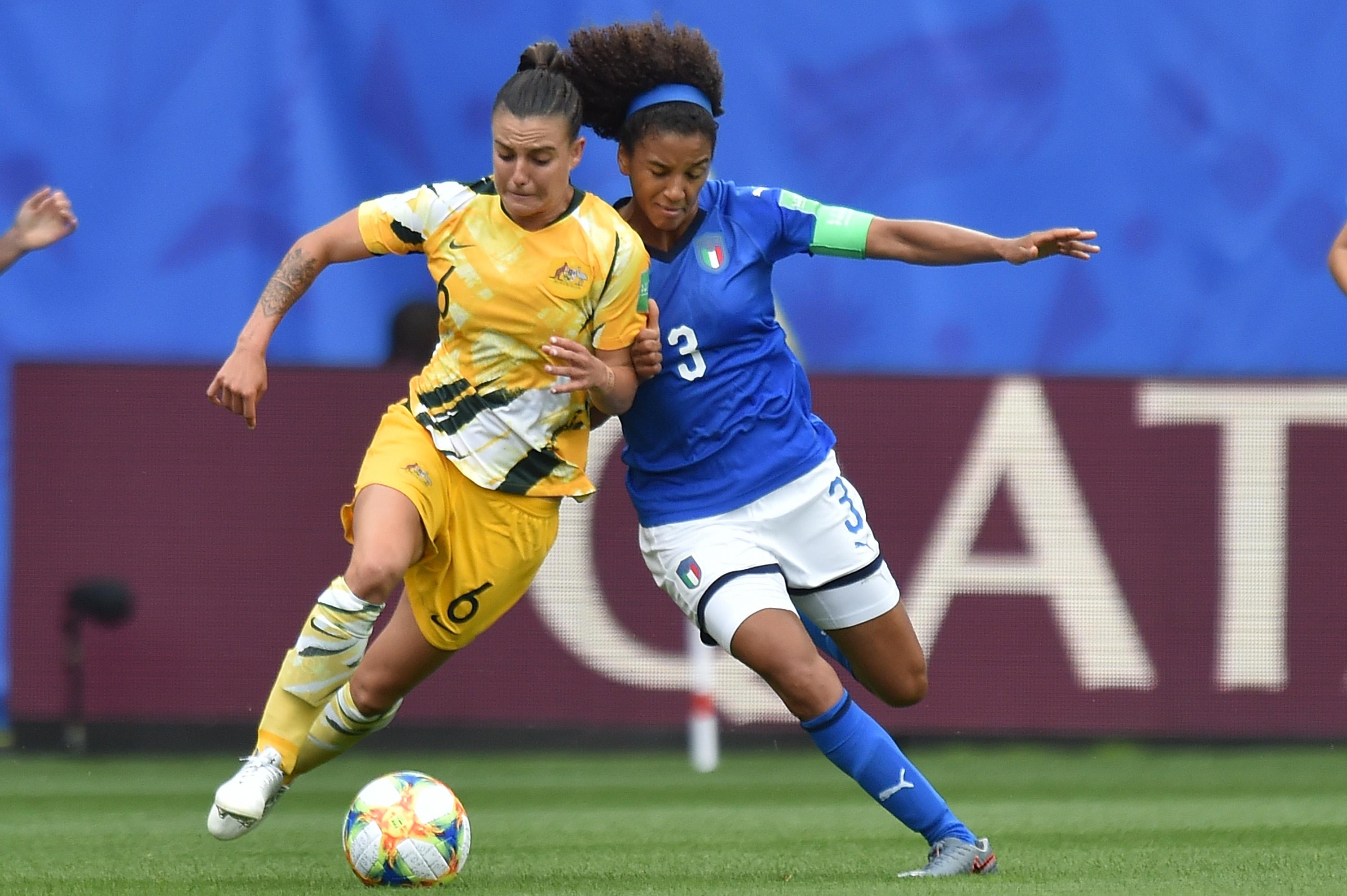 VALENCIENNES, FRANCE - JUNE 09: Caitlin Foord (L) of Australia and Sara Gama of Italy compete for the ball during the 2019 FIFA Women's World Cup France group C match between Australia and Italy at Stade du Hainaut on June 09, 2019 in Valenciennes, France. (Photo by Tullio M. Puglia/Getty Images)