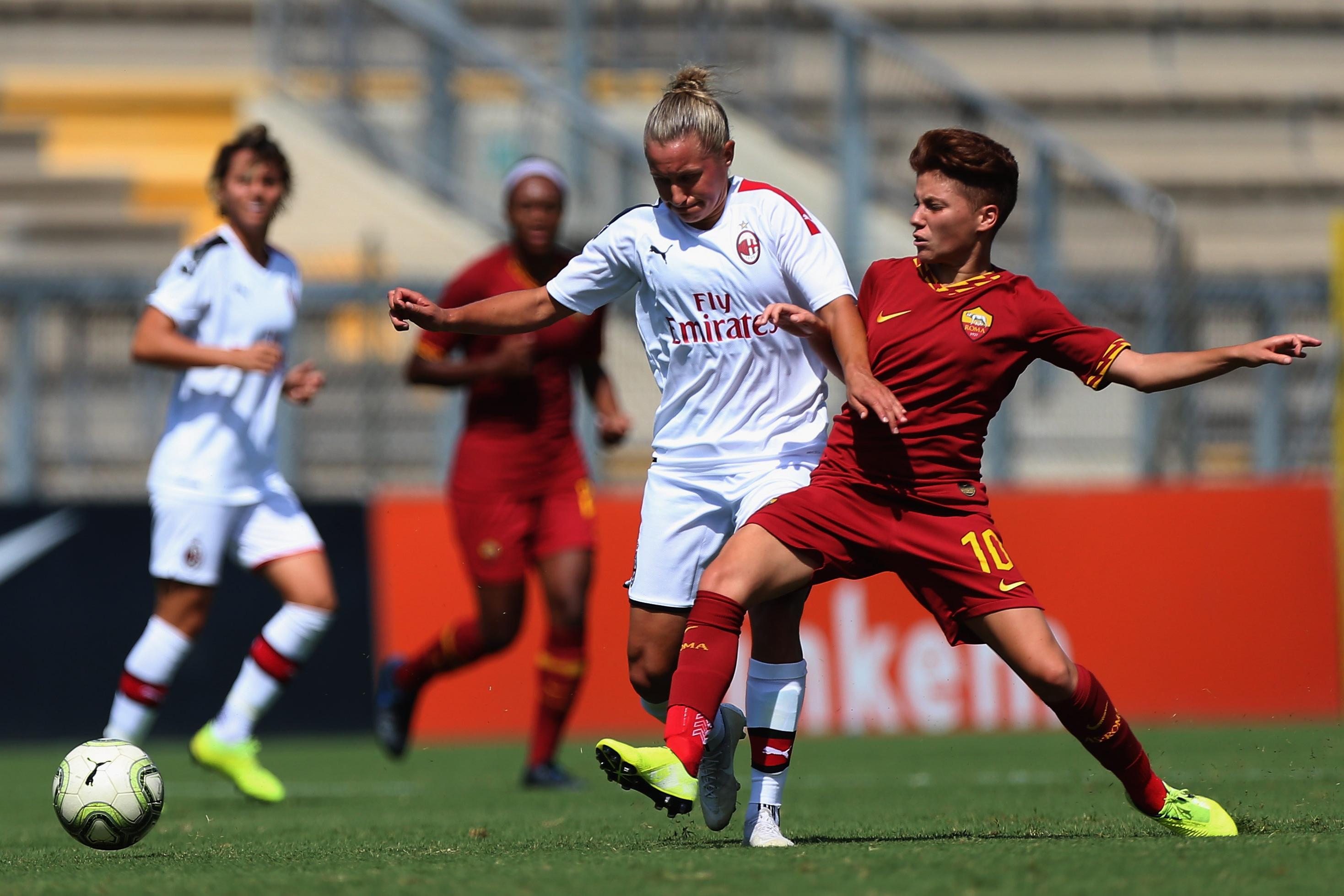 ROME, ITALY - SEPTEMBER 15: Manuela Giuliano of AS Roma competes for the ball with Stine Hovland of AC Milan during the Women Serie A match between AS Roma and AC Milan at Tre Fontane sport centre on September 15, 2019 in Rome, Italy. (Photo by Paolo Bruno/Getty Images)
