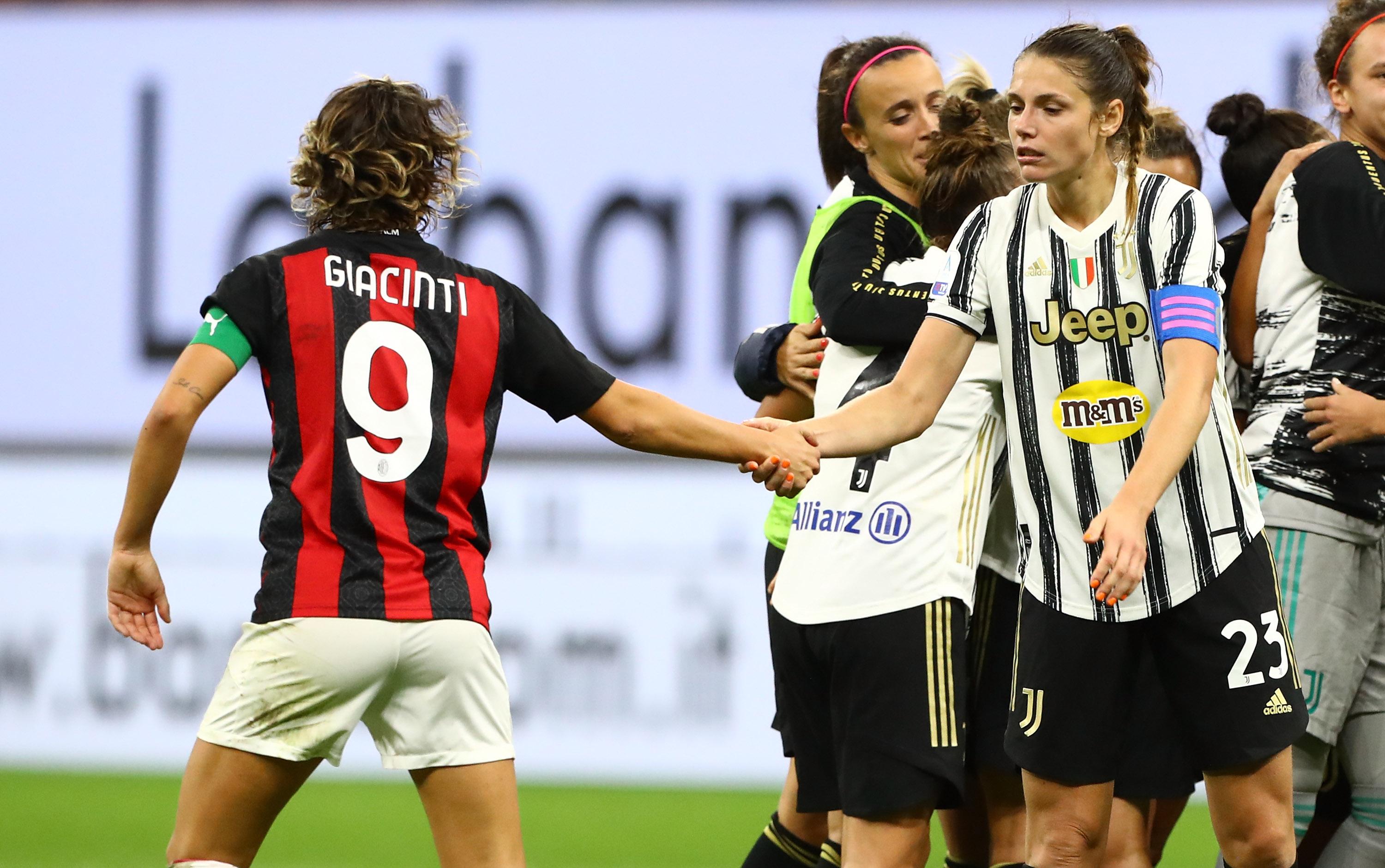 MILAN, ITALY - OCTOBER 05: Valentina Giacinti of AC Milan shakes hands with Cecilia Salvai of Juventus during the Women Serie A match between AC Milan and Juventus at Stadio Giuseppe Meazza on October 5, 2020 in Milan, Italy. (Photo by Marco Luzzani/Getty Images) *** Local Caption *** Valentina Giacinti; Cecilia Salvai