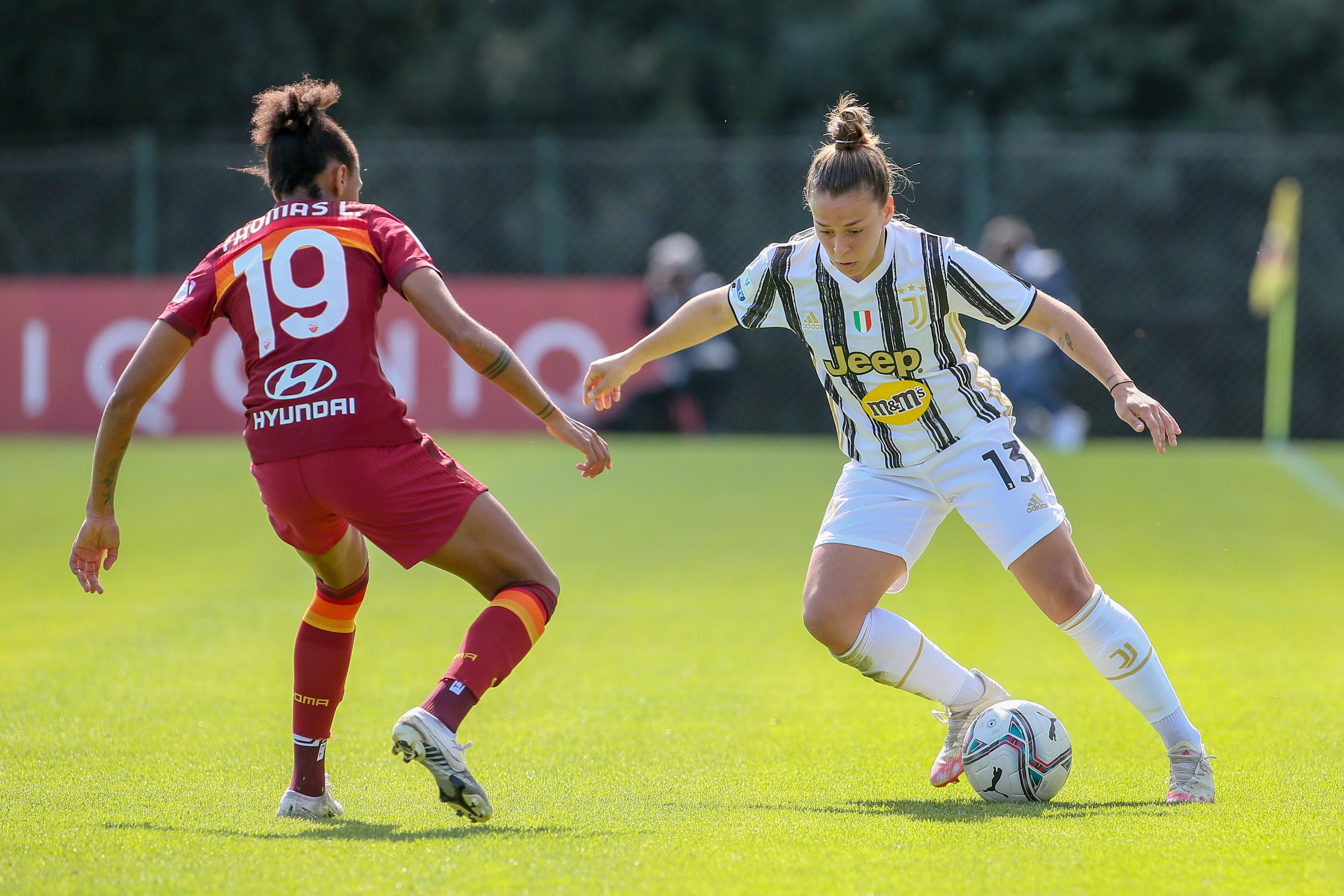 ROME, ITALY - MARCH 13: Lisa Boattin of Juventus is challenged by lindsey Kimb Thomas of AS Roma during the Women Coppa Italia match between AS Roma and Juventus at Stadio Tre Fontane on March 13, 2021 in Rome, Italy. (Photo by Giampiero Sposito/Getty Images)