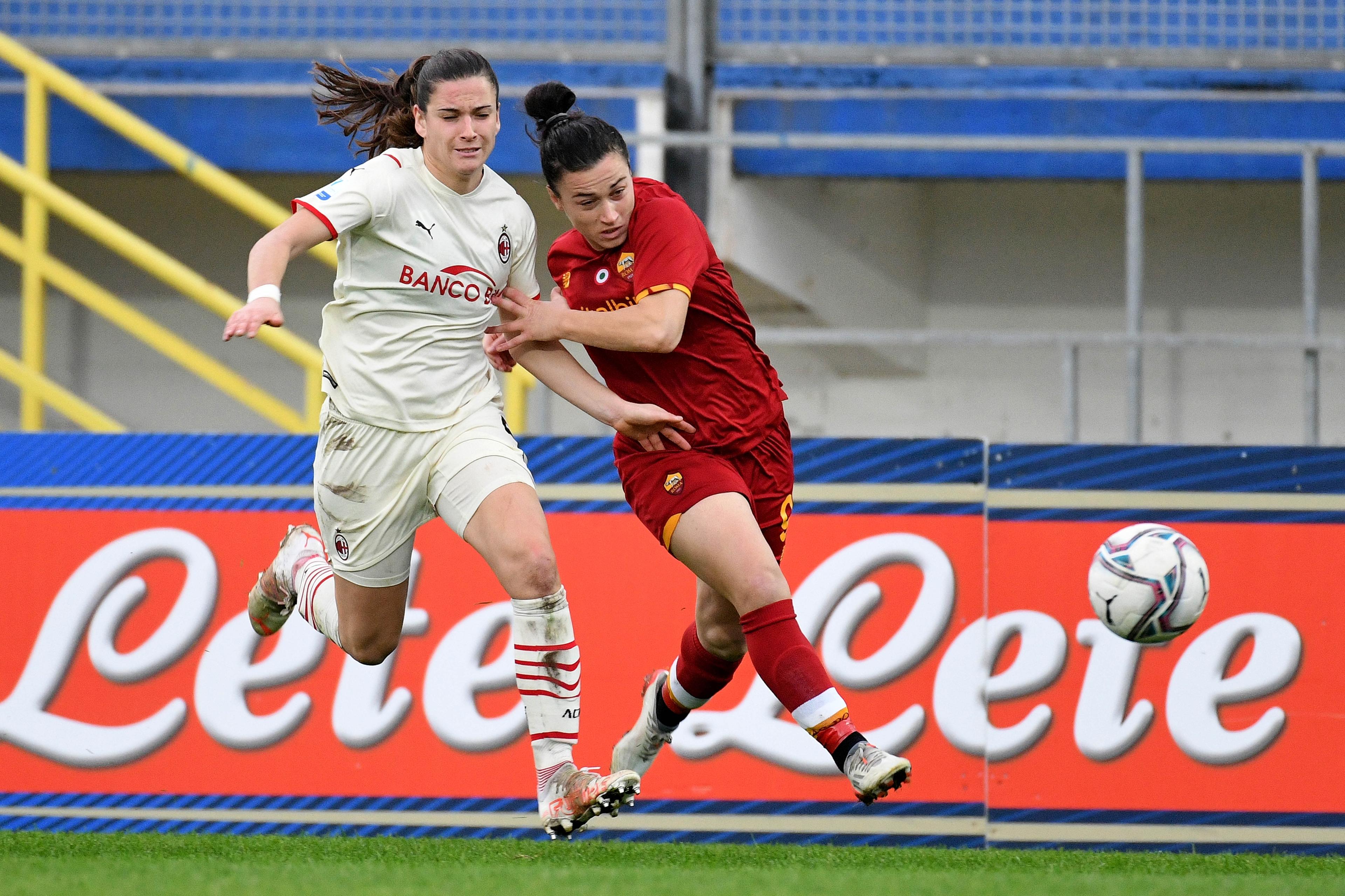 LATINA, ITALY - JANUARY 05: Valeria Pirone of AS Roma compete for the ball with Laura Fusetti of AC Milan during the woman Supercip semifinal match between AC Milan v AS Roma at Stadio Domenico Francioni on January 05, 2022 in Latina, Italy. (Photo by Marco Rosi/Getty Images)