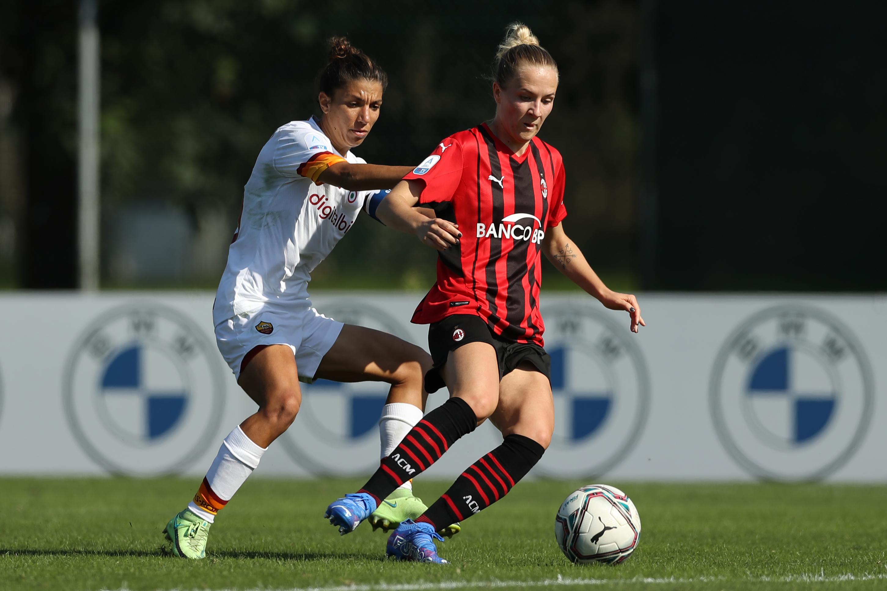 MILAN, ITALY - OCTOBER 10: Sara Thrige Andersen of AC Milan shields the ball from Elisa Bartoli of AS Roma during the Women Serie A match between AC Milan and AS Roma at Campo Sportivo Vismara on October 10, 2021 in Milan, Italy. (Photo by Jonathan Moscrop/Getty Images)