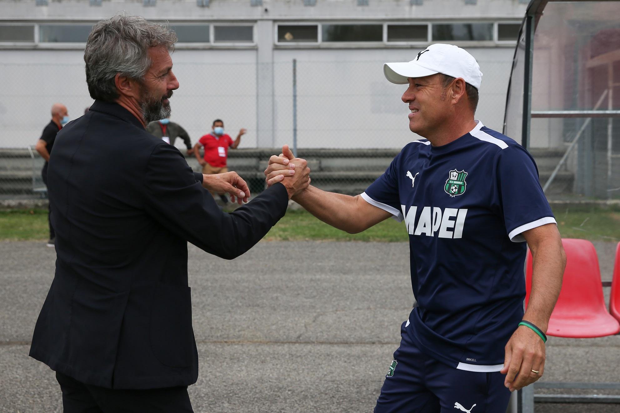 MILAN, ITALY - SEPTEMBER 25: Maurizio Ganz Head coach of AC Milan and Gianpiero Piovani Head coach of US Sassuolo prior to kick off in the Women's Serie A match between AC Milan and Sassuolo at Campo Sportivo Vismara on September 25, 2021 in Milan, Italy. (Photo by Jonathan Moscrop/Getty Images)