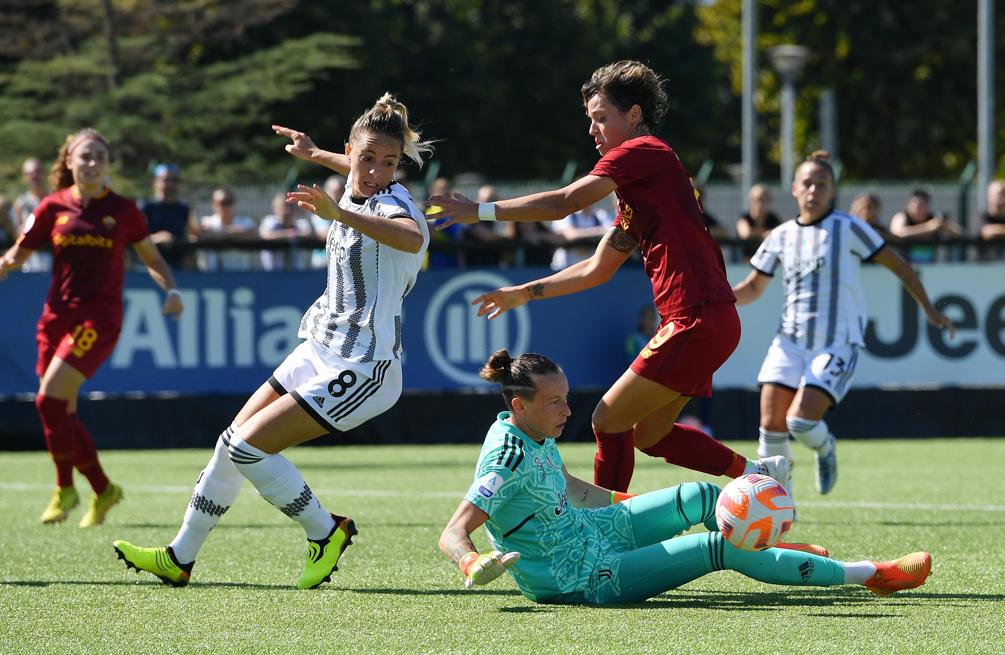 VINOVO, ITALY - SEPTEMBER 16: Pauline Peyraud-Magnin of Juventus and Martina Rosucci of Juventus battles for the ball with Valentina Giacinti of AS Roma during the Women Serie A match between Juventus and AS Roma at Juventus Center Vinovo on September 16, 2022 in Vinovo, Italy. (Photo by Chris Ricco/Getty Images)