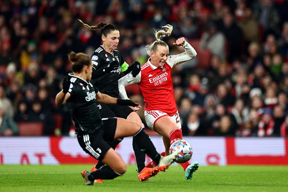LONDON, ENGLAND - DECEMBER 07: Stina Blackstenius of Arsenal is tackled by Cecilia Salvai and Lisa Boattin of Juventus during the UEFA Women's Champions League group C match between Arsenal and Juventus at Emirates Stadium on December 07, 2022 in London, England. (Photo by Clive Rose/Getty Images)