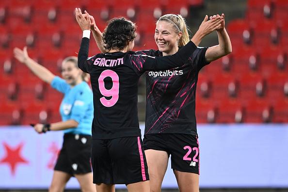 PRAGUE, CZECH REPUBLIC - DECEMBER 22: AS Roma players Sophie Roman Haug and Valentina Giacinti celebrate during the UEFA Women's Champions League group B match between Slavia Praha and AS Roma at Eden Arena on December 22, 2022 in Prague, Czech Republic. (Photo by Luciano Rossi/AS Roma via Getty Images)