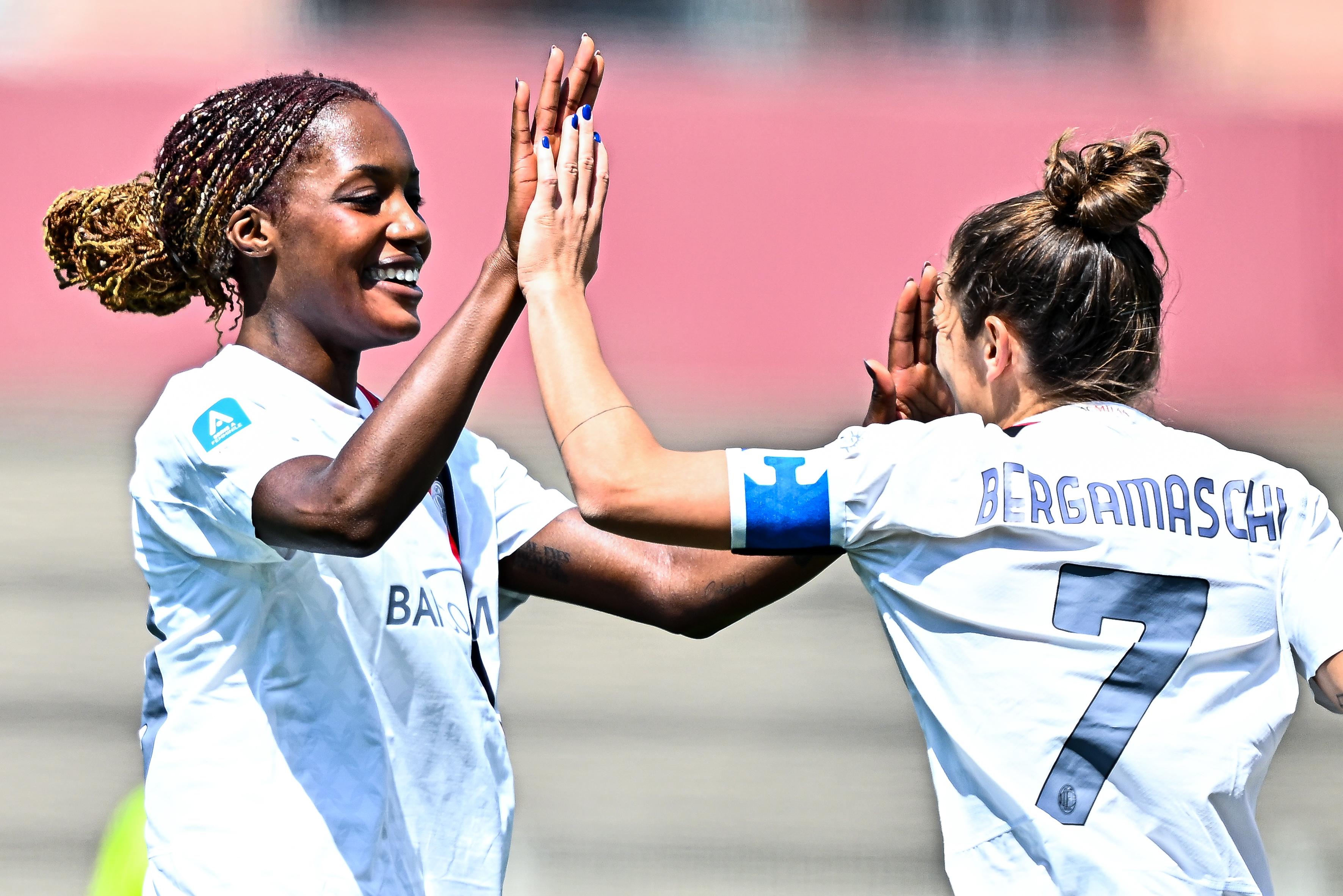 GENOA, ITALY - APRIL 21: Evelyn Ijeh of Milan (left) celebrates with her team-mate Valentina Bergamaschi after scoring a goal during the Women Serie A Playouts match between UC Sampdoria and AC Milan at Sciorba Stadium on April 21, 2024 in Genoa, Italy. (Photo by Simone Arveda - AC Milan/AC Milan via Getty Images)