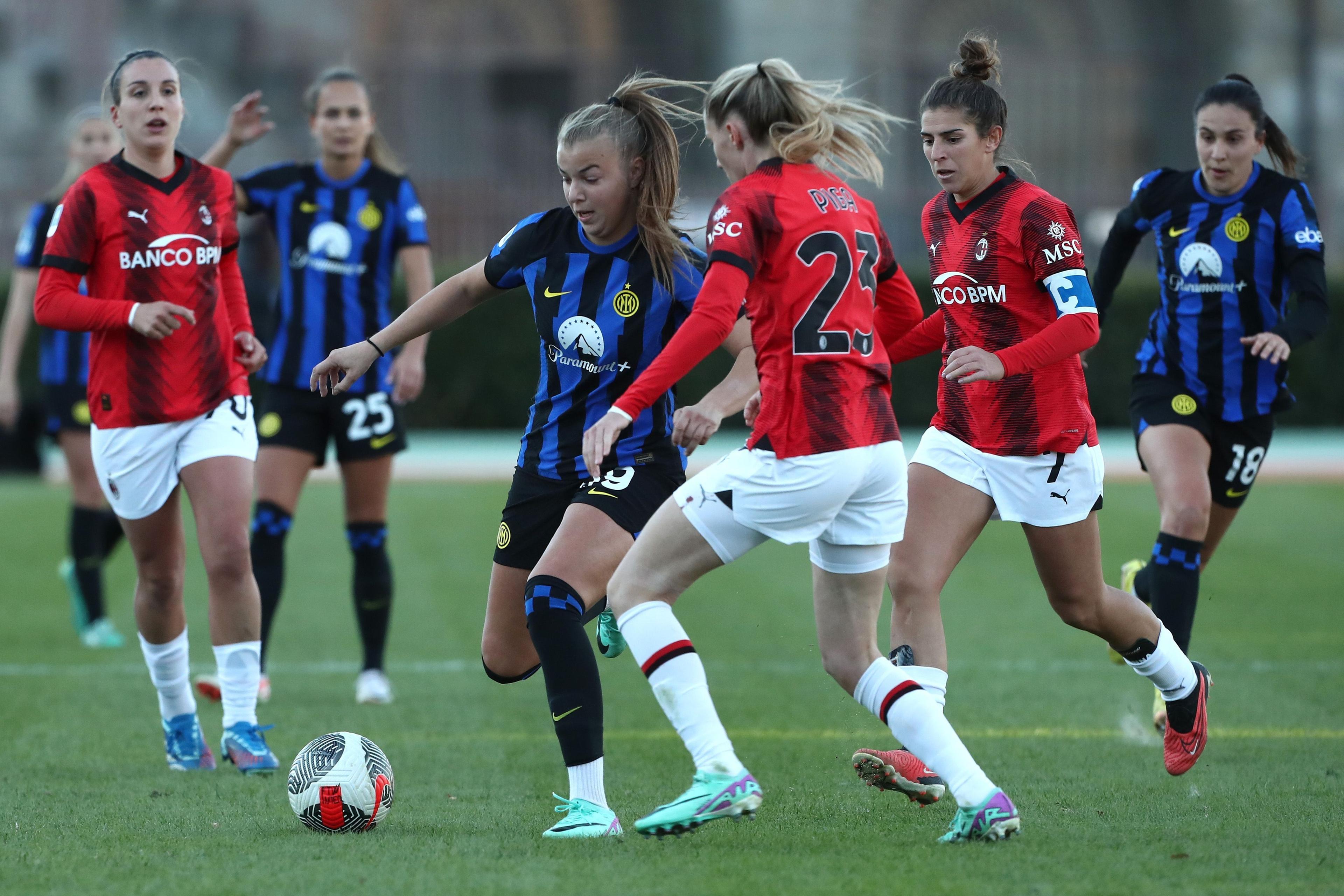 MILAN, ITALY - NOVEMBER 25: Julie Piga of AC Milan competes for the ball with Maja Jelcic of FC Internazionale during the Women Serie A eBay match between FC Internazionale and AC Milan at Arena Civica Gianni Brera on November 25, 2023 in Milan, Italy. (Photo by Marco Luzzani/Getty Images)