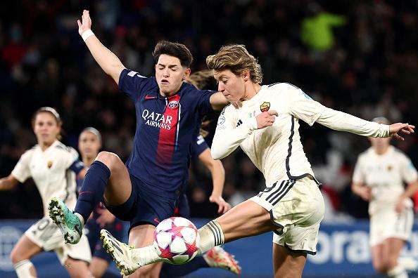 TOPSHOT - Paris Saint Germain\\'s French defender #05 Elisa De Almeida (L) fights for the ball with AS Roma\\'s Italian forward #09 Valentina Giacinti (R) during the UEFA Women\\'s Champions League Group C football match between Paris Saint-Germain (PSG) and AS Roma at the Parc des Princes stadium in Paris, on December 14, 2023. (Photo by FRANCK FIFE / AFP) (Photo by FRANCK FIFE/AFP via Getty Images)