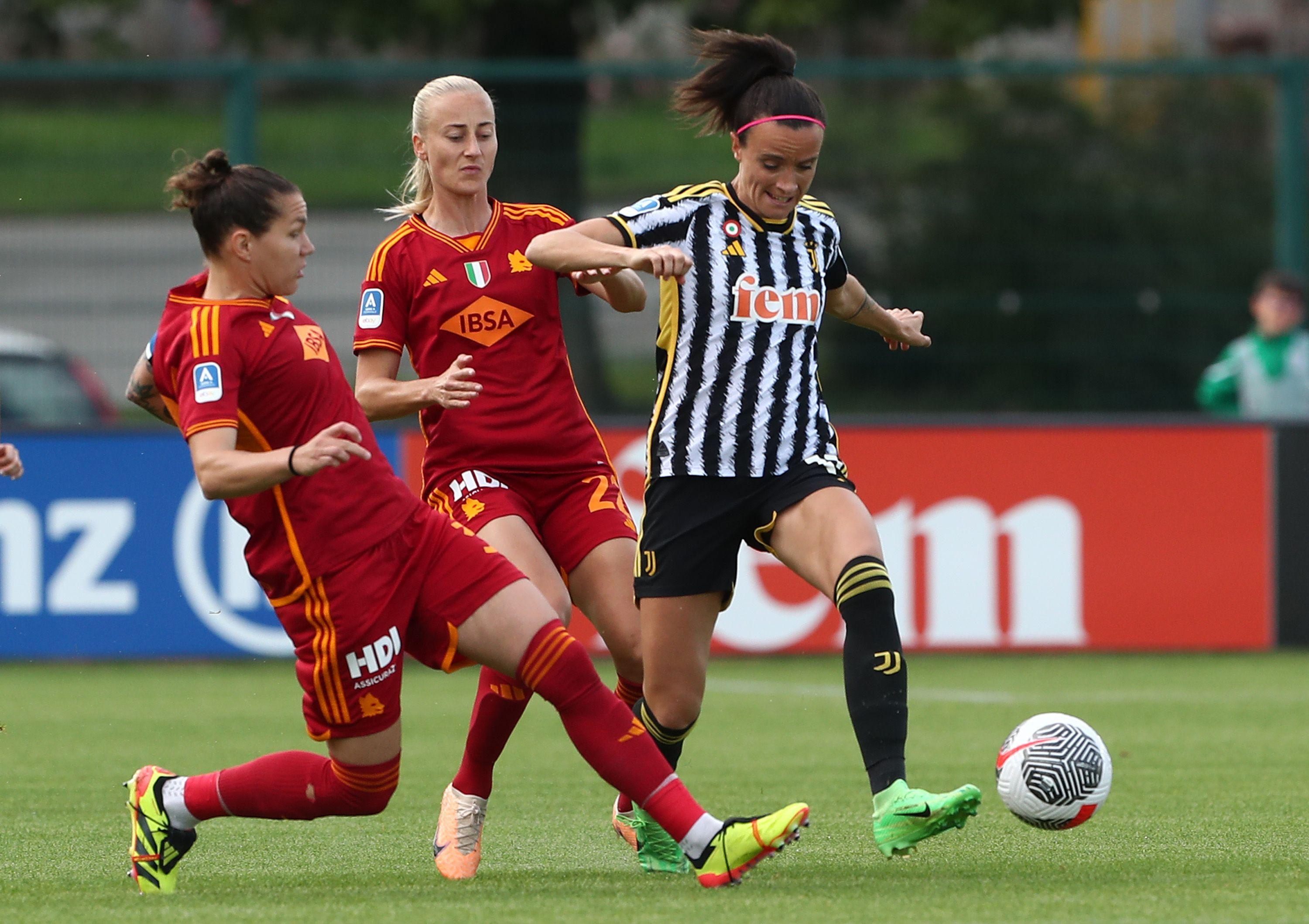 BIELLA, ITALY - MAY 13: Barbara Bonansea of Juventus competes for the ball with Elena Linari and Anja Sonstevold of AS Roma during the Women Serie A match between Juventus and AS Roma on May 13, 2024 in Biella, Italy. (Photo by Marco Luzzani/Getty Images)