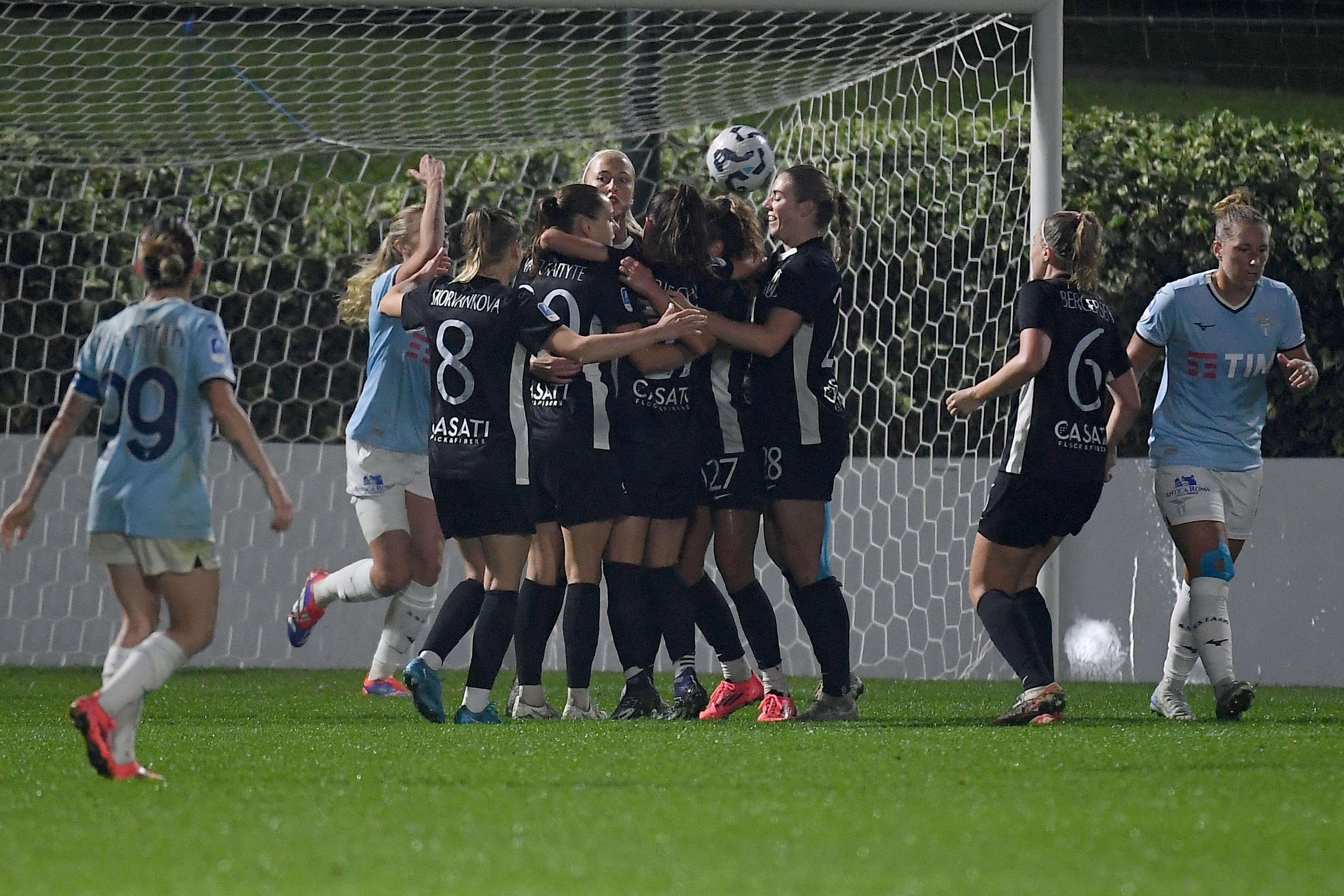 ROME, ITALY - NOVEMBER 02: Julia Karlernas of Como women celebrates a opening goal from a penalty with team mates during during the women Serie A match between SS Lazio women and Como women at the Formello sport centre on November 02, 2024 in Rome, Italy. (Photo by Marco Rosi - SS Lazio/Getty Images)