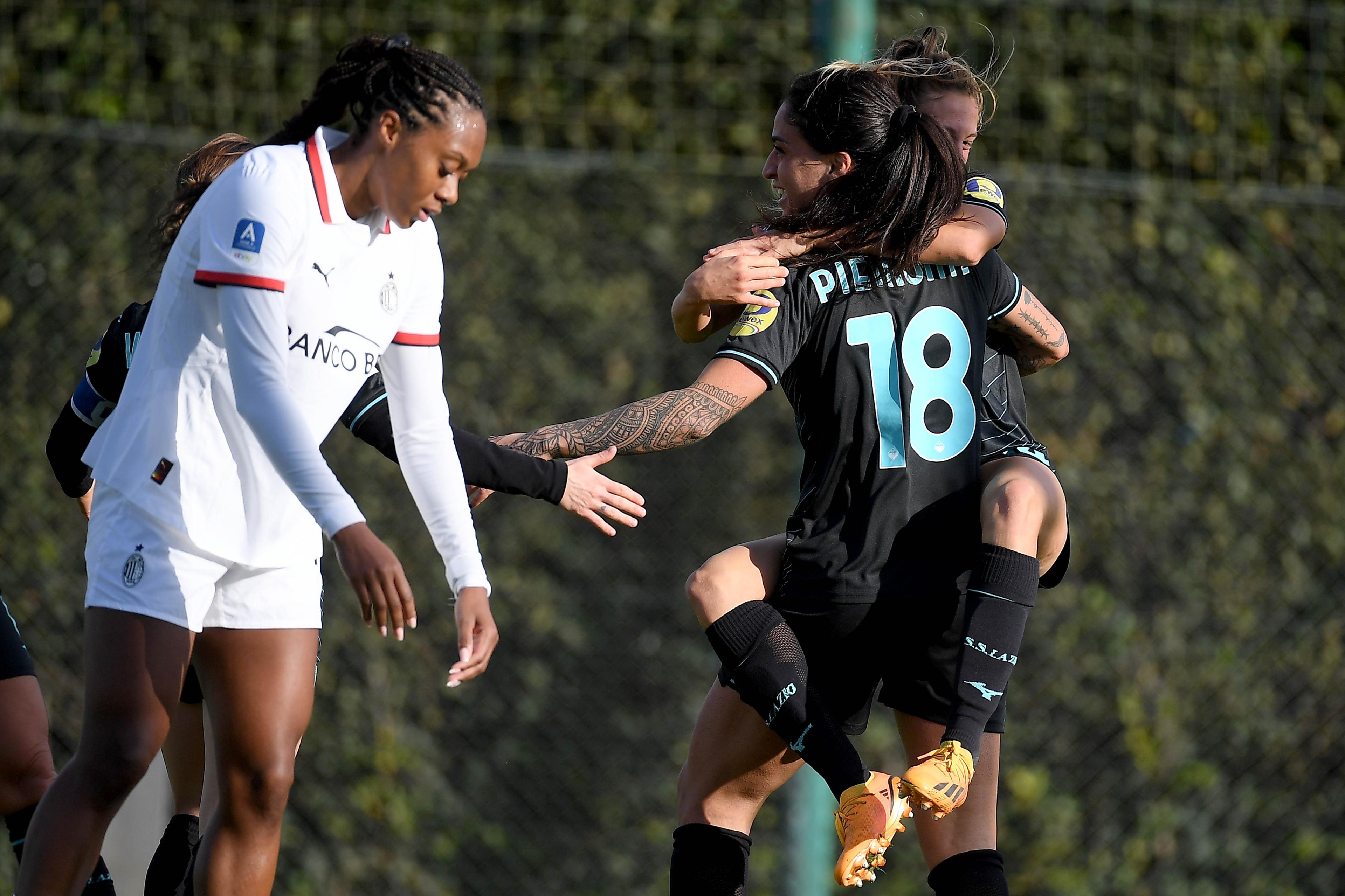 ROME, ITALY - DECEMBER 14: Martina Piemonte of SS Lazio celebrates with teammates after scoring her team's second goal during the Women Serie A match between SS Lazio women and Milan women at the formello sport centre on December 14, 2024 in Rome, Italy. (Photo by Marco Rosi - SS Lazio/Getty Images)