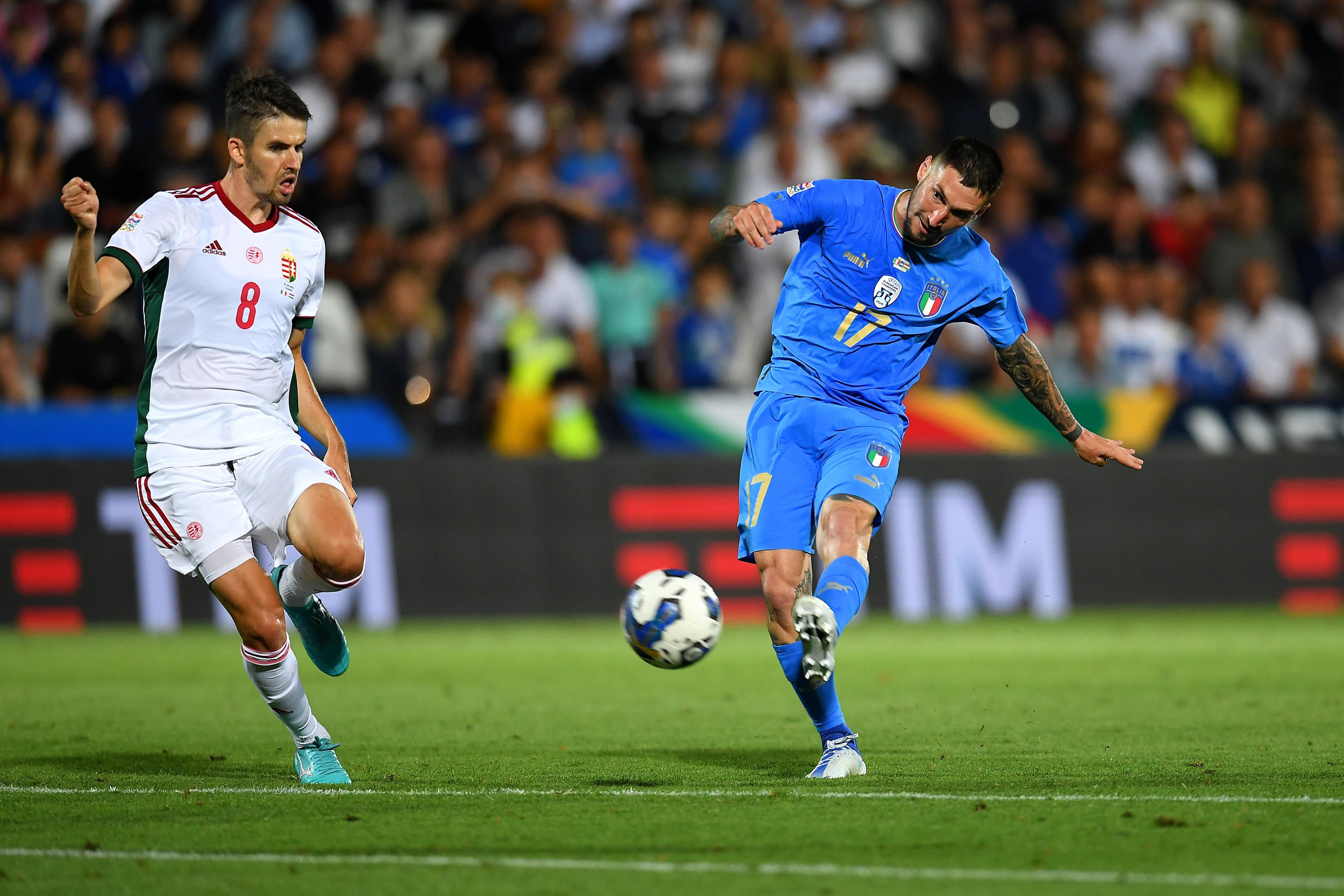 CESENA, ITALY - JUNE 07: Matteo Politano of Italy is challenged by Adam Nagy of Hungary during the UEFA Nations League League A Group 3 match between Italy and Hungary on June 07, 2022 in Cesena, Italy. (Photo by Claudio Villa/Getty Images)