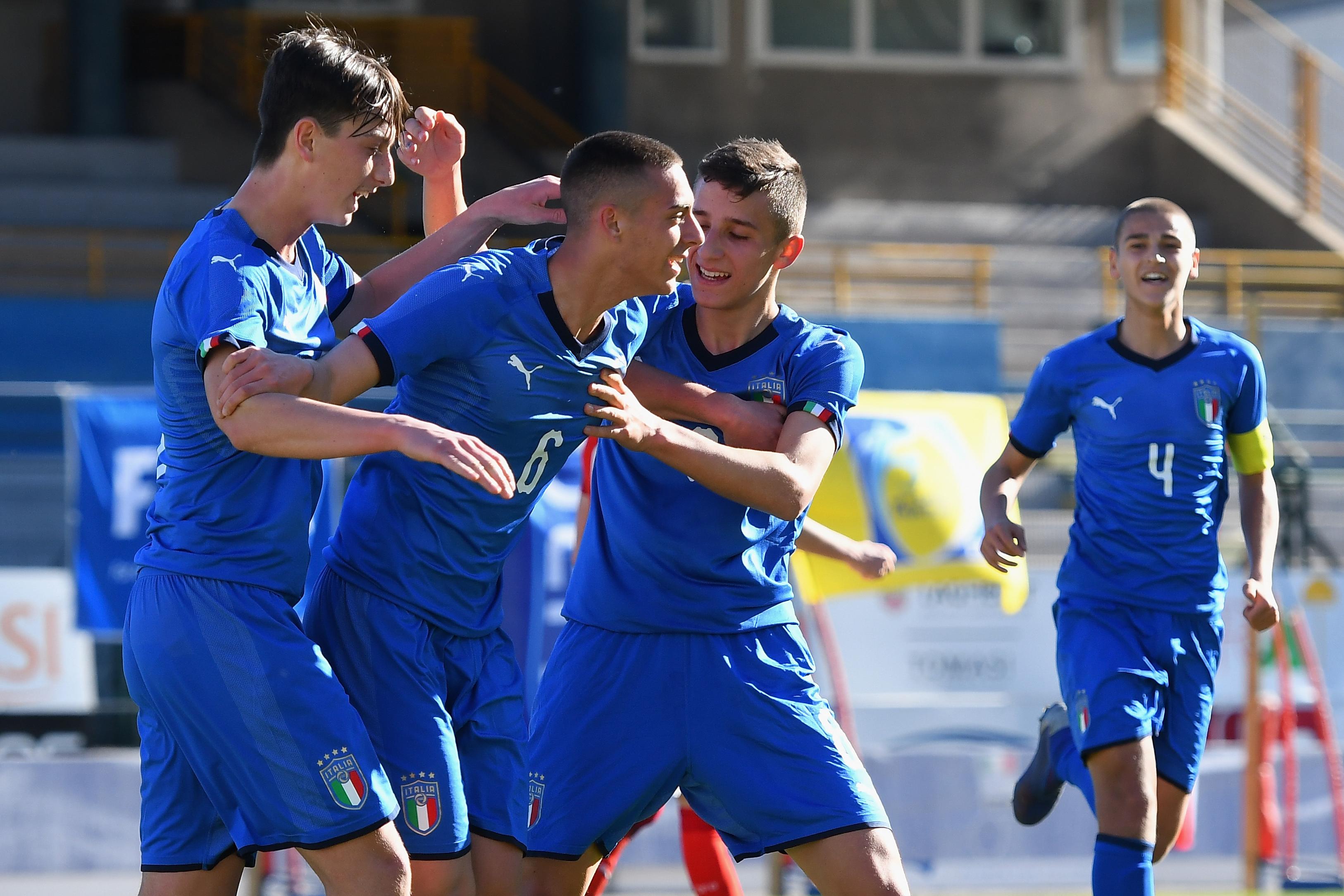 TRENTO, ITALY - MARCH 12:  Matteo Pellegrini of Italy U15 celebrates after scoring the opening goal with team mates during the International Friendly match between Italy U15 and Austria U15 at Stadio Briamasco on March 12, 2019 in Trento, Italy.  (Photo by Alessandro Sabattini/Getty Images)