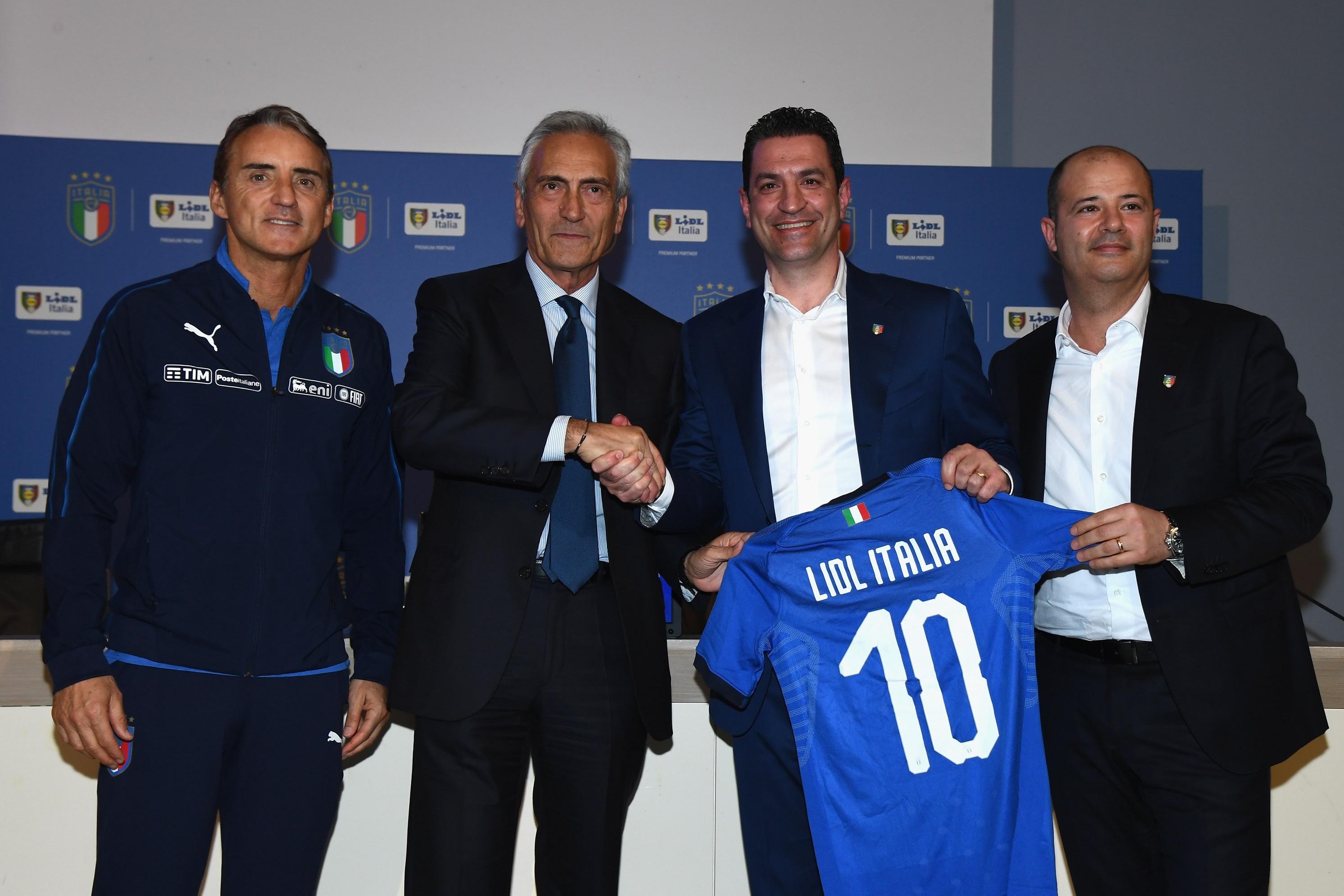 FLORENCE, ITALY - MARCH 19: (L-R) Italy Head Coach Roberto Mancini, FIGC President Gabriele Gravina, Lidl President Massimiliano Silvestri and Lidl CEO Eduardo Tursi attend a press confernce to announce partnership between FIGC and lidl at Centro Tecnico Federale di Coverciano on March 19, 2019 in Florence, Italy. (Photo by Claudio Villa/Getty Images)