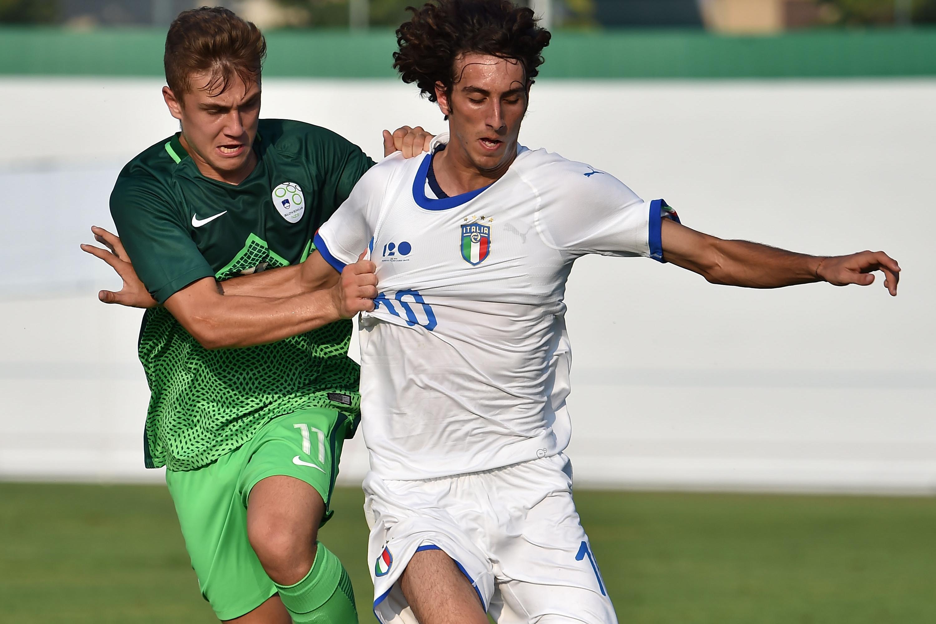PORDENONE, ITALY - AUGUST 07:  Renato Simic of Slovenia U 18 and Alessandro Cortinovis of Italy U18 in action during the International Friendly match between Italy U18 and Slovenia U18 on August 7, 2018 in Pordenone, Italy.  (Photo by Giuseppe Bellini/Getty Images);
