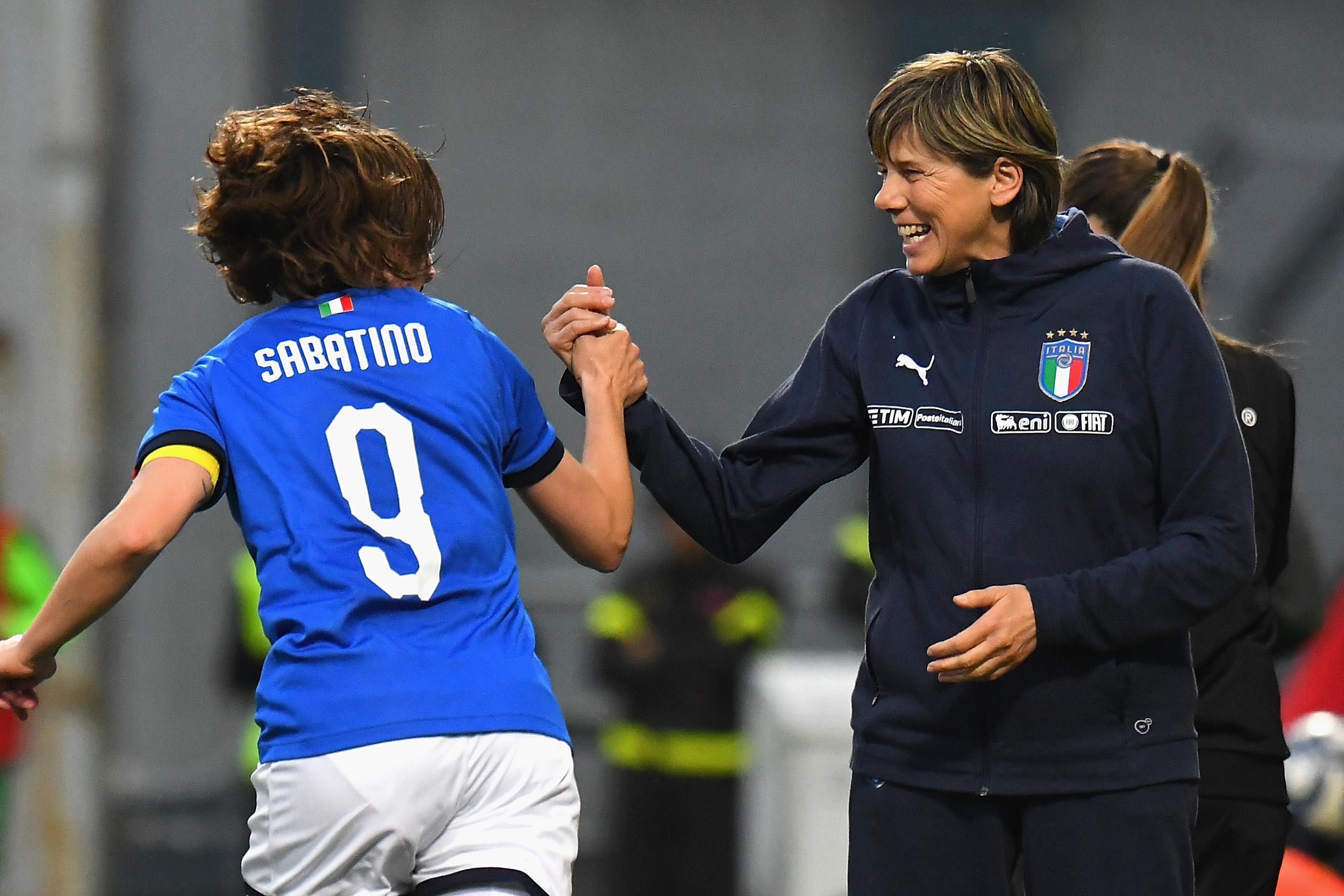 REGGIO NELL\\'EMILIA, ITALY - APRIL 09: Daniela Sabatino of Italy Woman celebrates after scoring his team second goal with Milena Bertolini head coach of Italy Woman during the International Friendly match between Italy Women and Ireland Women at Mapei Stadium - Citt\\u00C3\\u00A0 del Tricolore on April 9, 2019 in Reggio nell\\'Emilia, Italy  (Photo by Alessandro Sabattini/Getty Images)