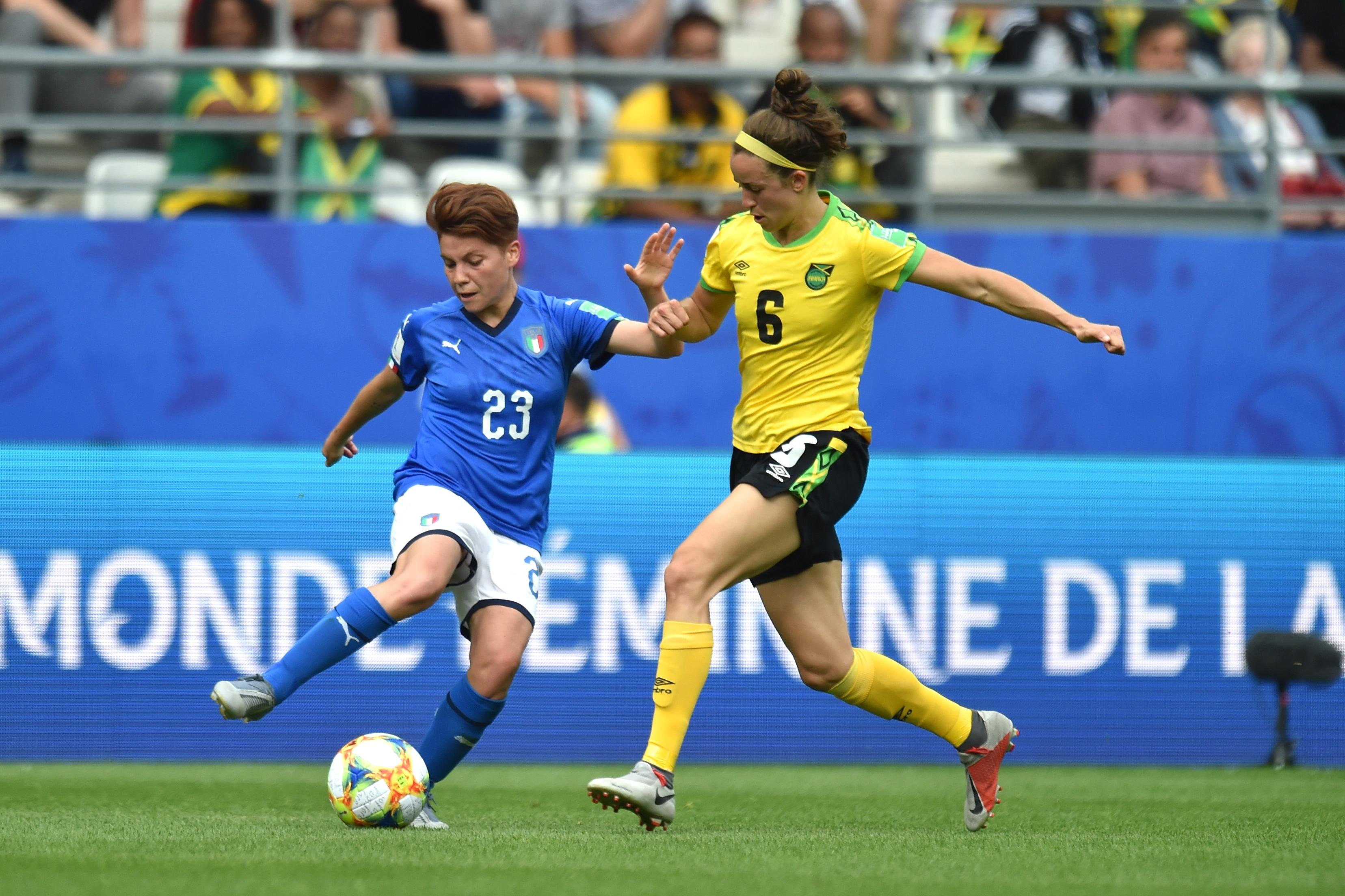REIMS, FRANCE - JUNE 14: Manuela Giugliano (R) of Italy is challenged by Havana Solaun of Jamaica during the 2019 FIFA Women\\'s World Cup France group C match between Jamaica and Italy at Stade Auguste Delaune on June 14, 2019 in Reims, France. (Photo by Tullio M. Puglia/Getty Images)