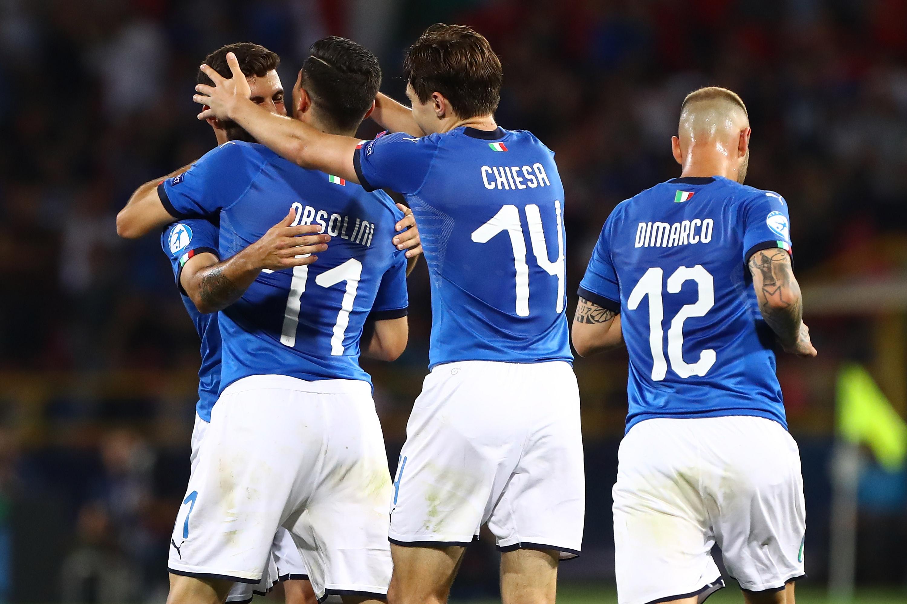 BOLOGNA, ITALY - JUNE 16:  Federico Chiesa #14 of Italy celebrates his second goal with his team-mates during the 2019 UEFA U-21 Group A match between Italy and Spain at (insert stadium name) on June 16, 2019 in Bologna, Italy.  (Photo by Marco Luzzani/Getty Images)