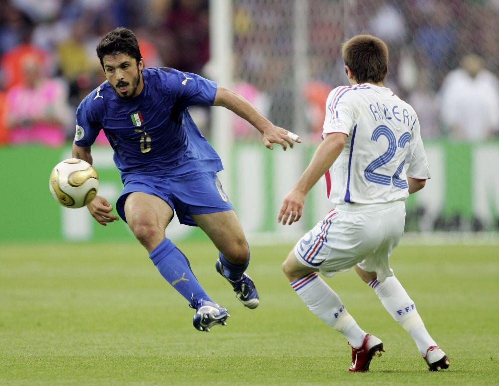 BERLIN - JULY 09: Gennaro Gattuso (L) of Italy controls the ball as Frank Ribery of France closes in during the FIFA World Cup Germany 2006 Final match between Italy and France at the Olympic Stadium on July 9, 2006 in Berlin, Germany. (Photo by Andreas Rentz/Bongarts/Getty Images)