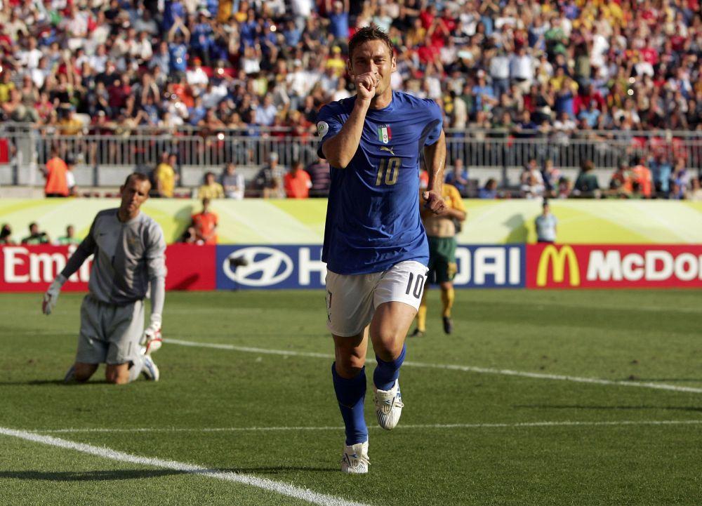KAISERSLAUTERN, GERMANY - JUNE 26: Francesco Totti of Italy celebrates, after scoring the match winning penalty during the FIFA World Cup Germany 2006 Round of 16 match between Italy and Australia at the Fritz-Walter Stadium on June 26, 2006 in Kaiserslautern, Germany. (Photo by Robert Cianflone/Getty Images)