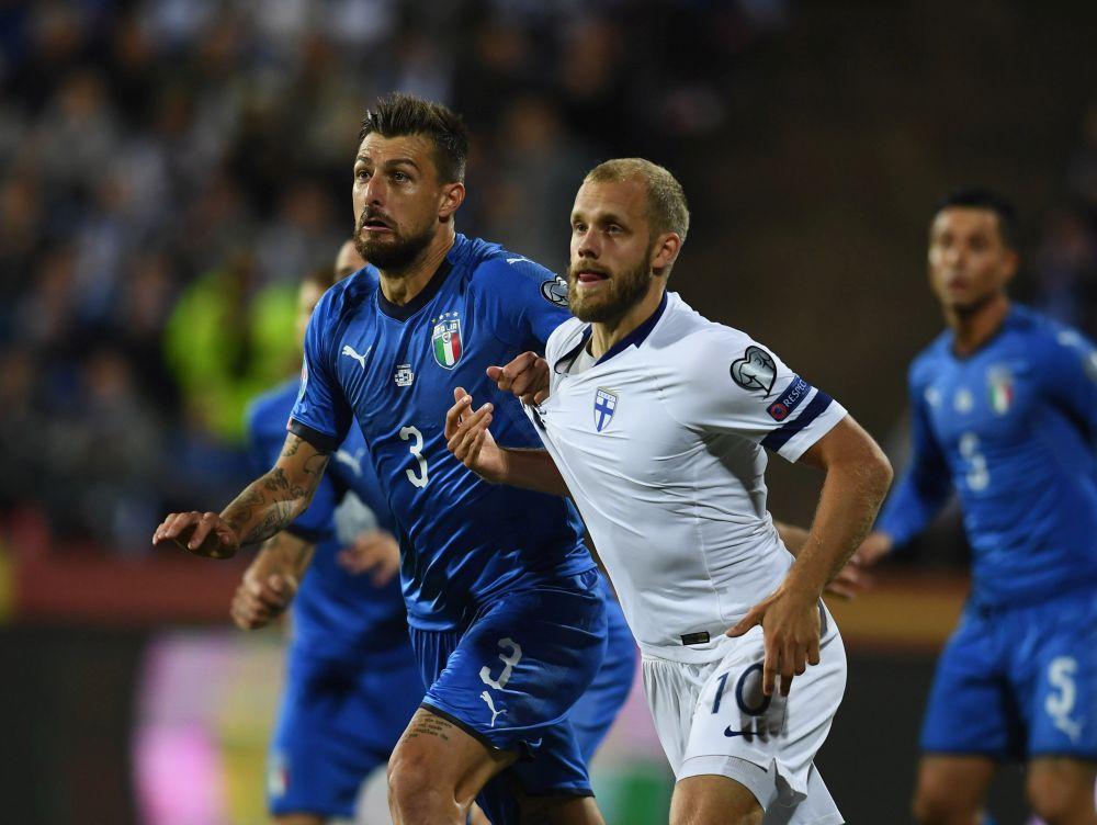 TAMPERE, FINLAND - SEPTEMBER 08: Francesco Acerbi of Italy competes for the ball with Pukki of Finland during the UEFA Euro 2020 qualifier between Italy and Finland at Tampere stadium (Ratina stadium) on September 8, 2019 in Tampere, Finland. (Photo by Claudio Villa/Getty Images)