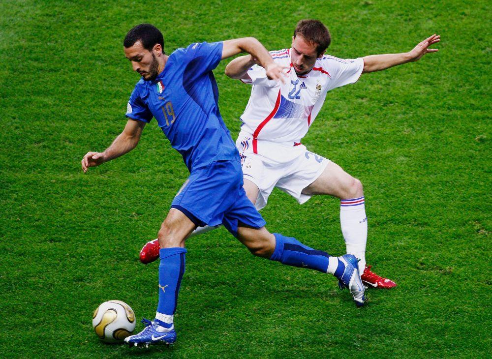 BERLIN - JULY 9: Frank Ribery of France challenges Gianluca Zambrotta of Italy during the FIFA World Cup Germany 2006 Final match between Italy and France at the Olympic Stadium on July 9, 2006 in Berlin, Germany. (Photo by Clive Mason/Getty Images)