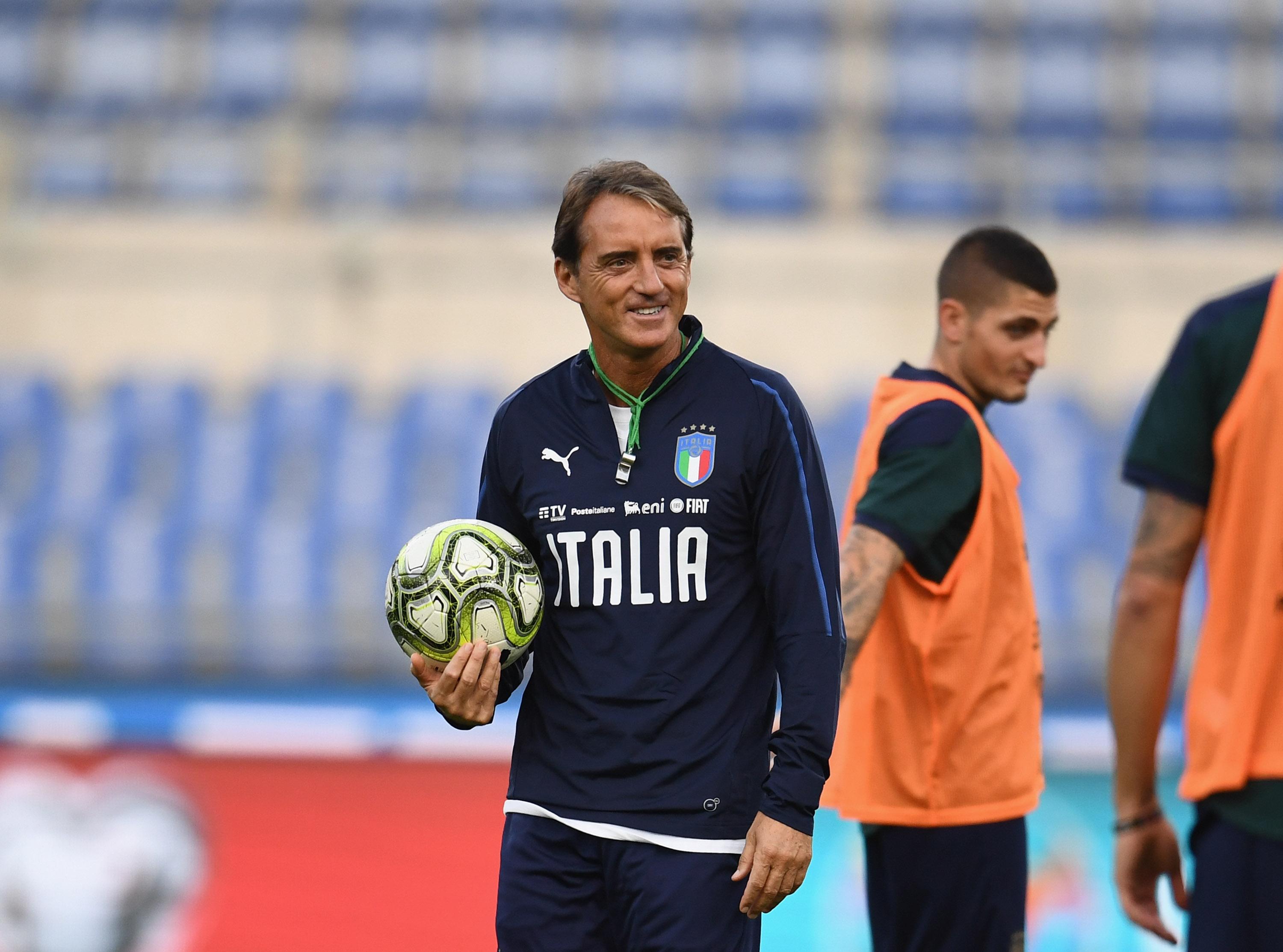 ROME, ITALY - OCTOBER 11: Head coach Italy Roberto Mancini smiles during the Italy training session at Stadio Olimpico on October 11, 2019 in Rome, Italy. (Photo by Claudio Villa/Getty Images) *** Local Caption *** Roberto Mancini