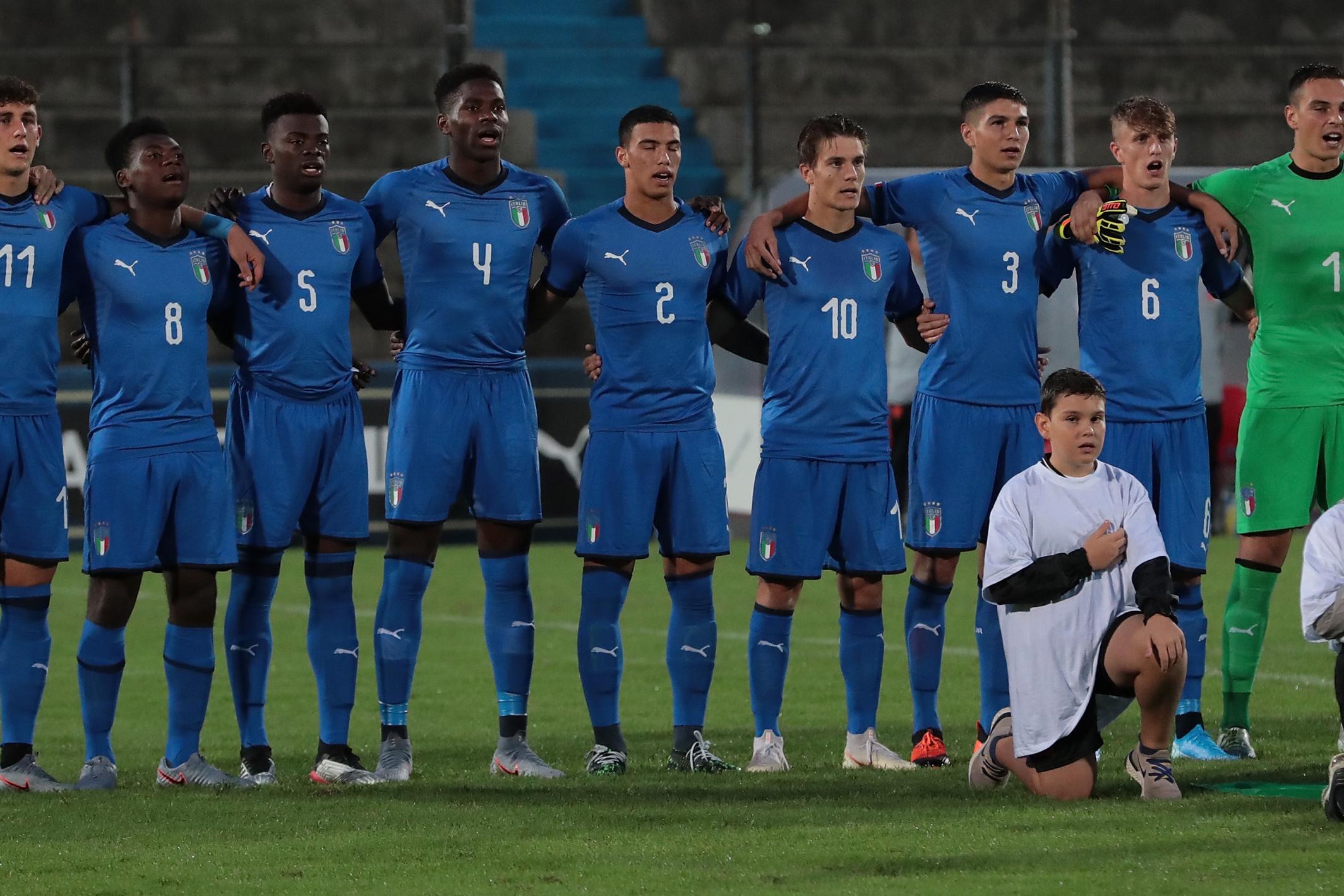 FIORENZUOLA D\\'ARDA, ITALY - SEPTEMBER 06:  Italy team line up for the anthem prior to the International Friendly match between Italy U19 and Nethrerlands U19 on September 6, 2019 in Fiorenzuola d\\'Arda, Italy.  (Photo by Emilio Andreoli/Getty Images)