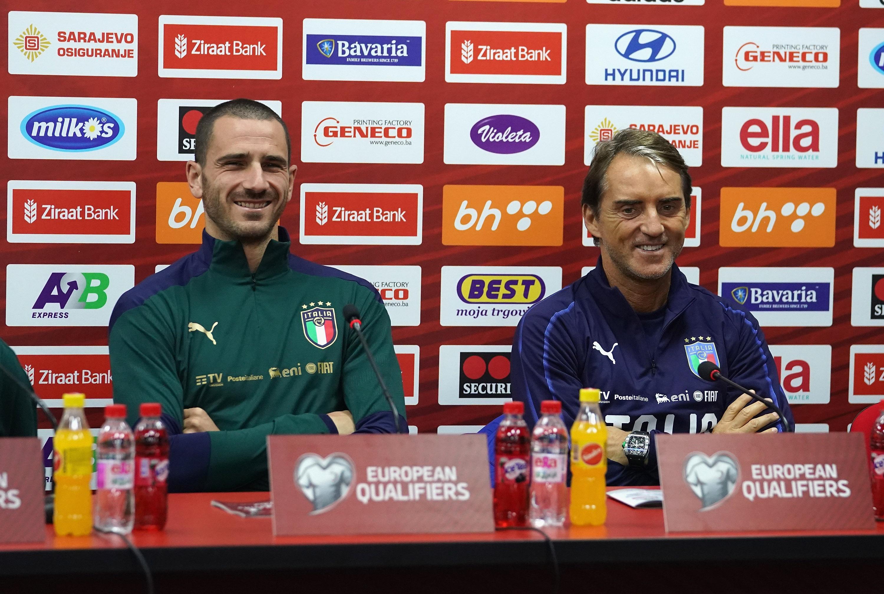 SARAJEVO, BOSNIA AND HERZEGOVINA - NOVEMBER 14: Head coach Italy Roberto Mancini and Leonardo Bonucci of Italy speak with the media during Italy press conference at Bilino Polje Stadium on November 14, 2019 in Sarajevo, Bosnia and Herzegovina. (Photo by Claudio Villa/Getty Images) *** Local Caption *** Leonardo Bonucci; Roberto Mancini