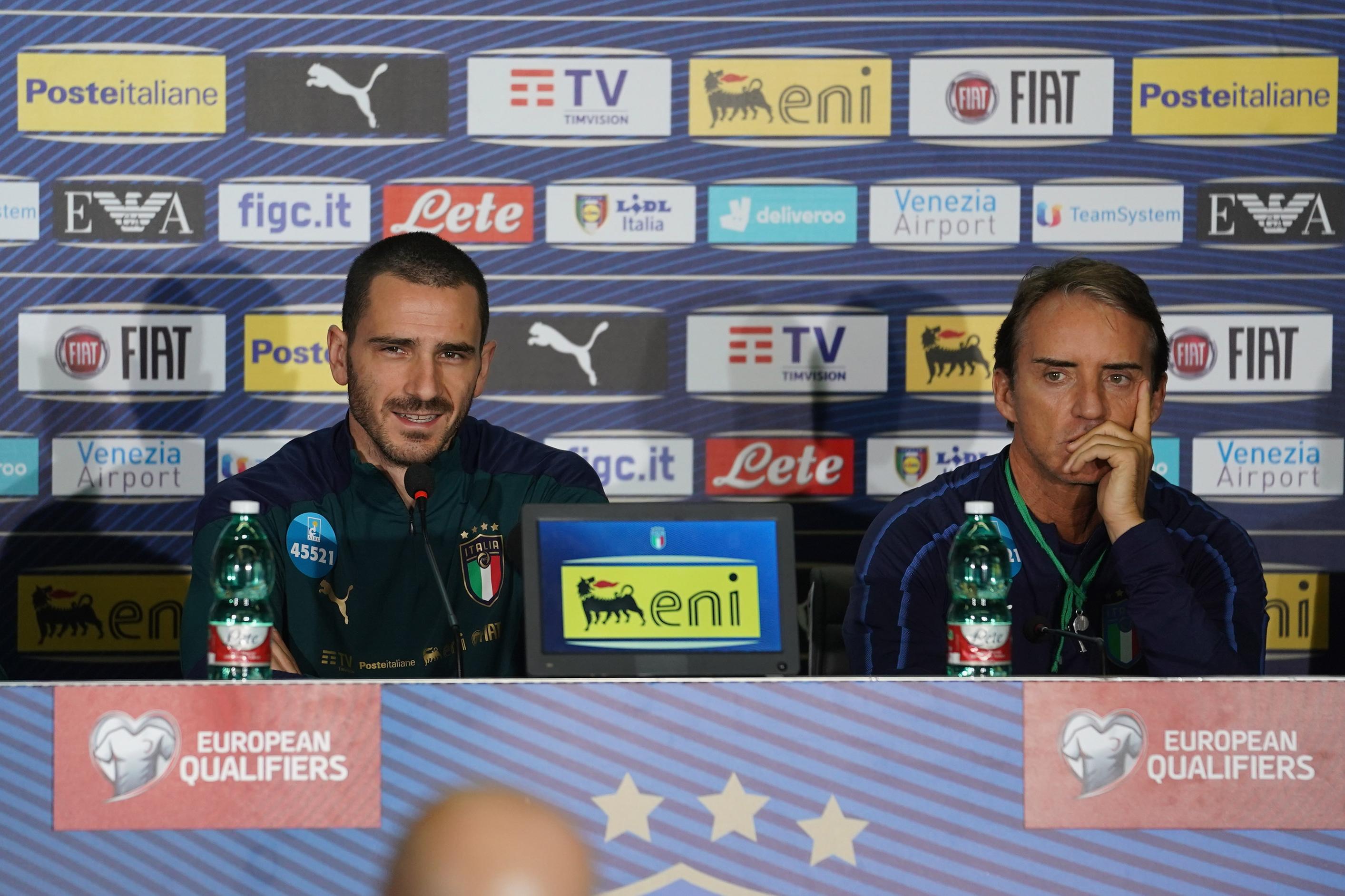 PALERMO, ITALY - NOVEMBER 17:  Head coach Italy Roberto Mancini and Leonardo Bonucci of Italy speak with the media during Italy press conference on November 17, 2019 in Palermo, Italy.  (Photo by Claudio Villa/Getty Images)