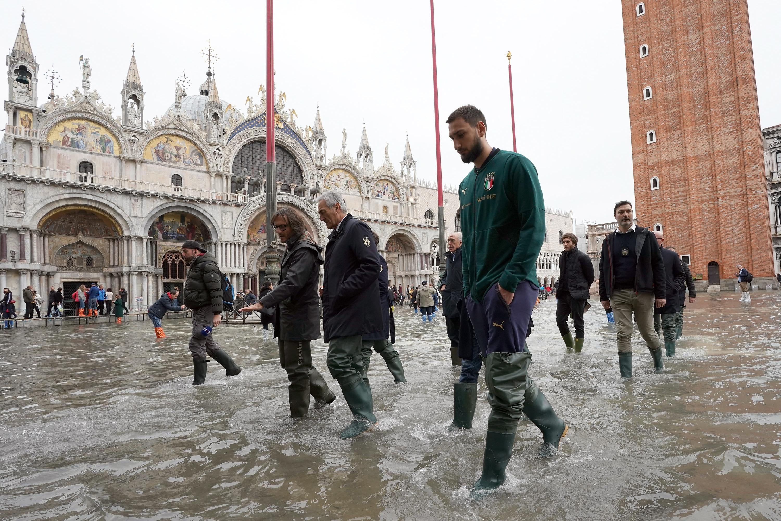 VENICE, ITALY - NOVEMBER 16:  President FIGC Gabriele Gravina and Gianluigi Donnarumma of Italy visit Venice  during the high water on November 16, 2019 in Venice, Italy.  (Photo by Claudio Villa/Getty Images)