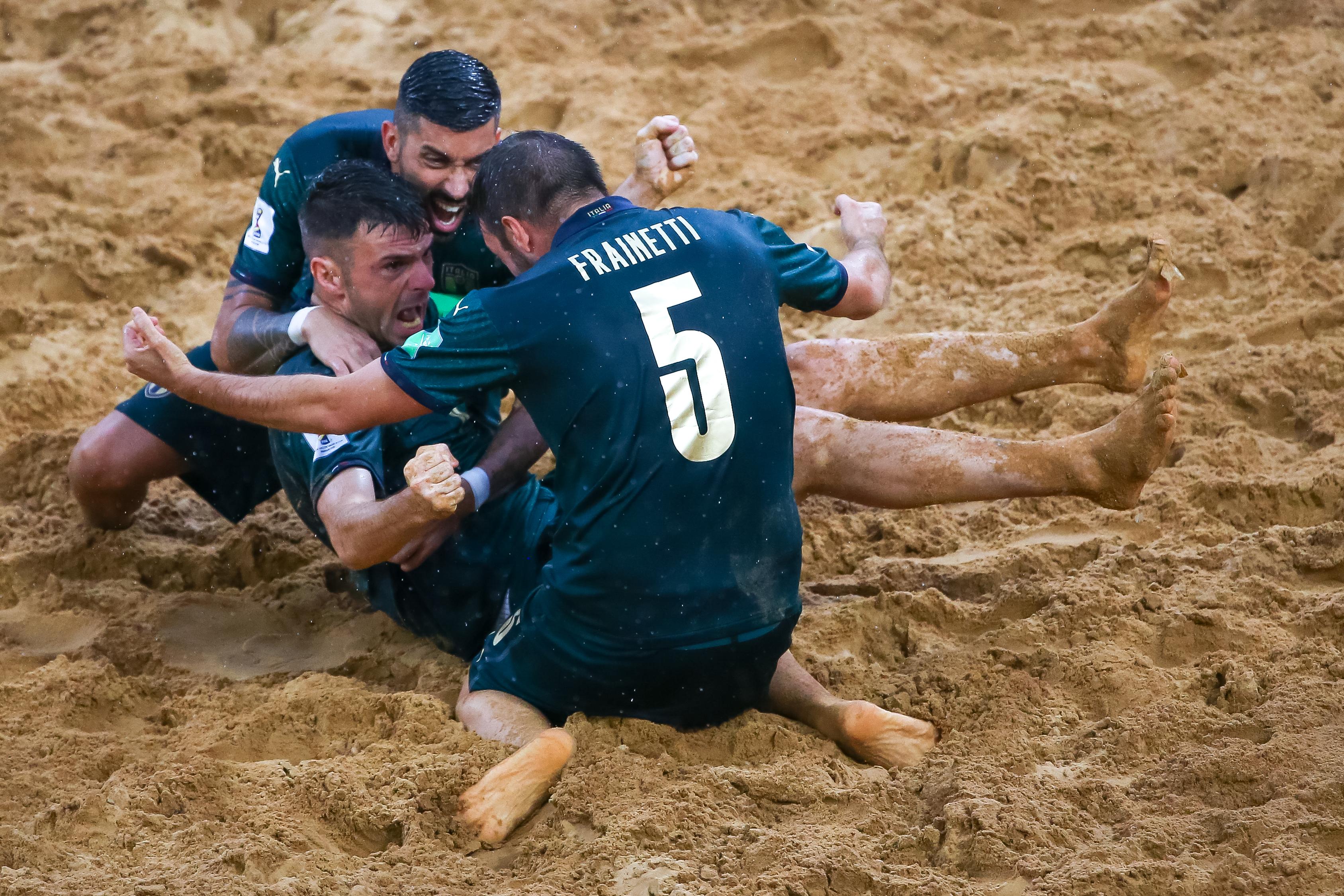 ASUNCION, PARAGUAY - NOVEMBER 30: Francesco Corosiniti of Italy celebrates a goal  with his teammates during the FIFA Beach Soccer World Cup Paraguay 2019 semi final match between Italy and Russia at Estadio Mundialista Los Pynandi on November 30, 2019 in Asuncion, Paraguay. (Photo by Buda Mendes - FIFA/FIFA via Getty Images)