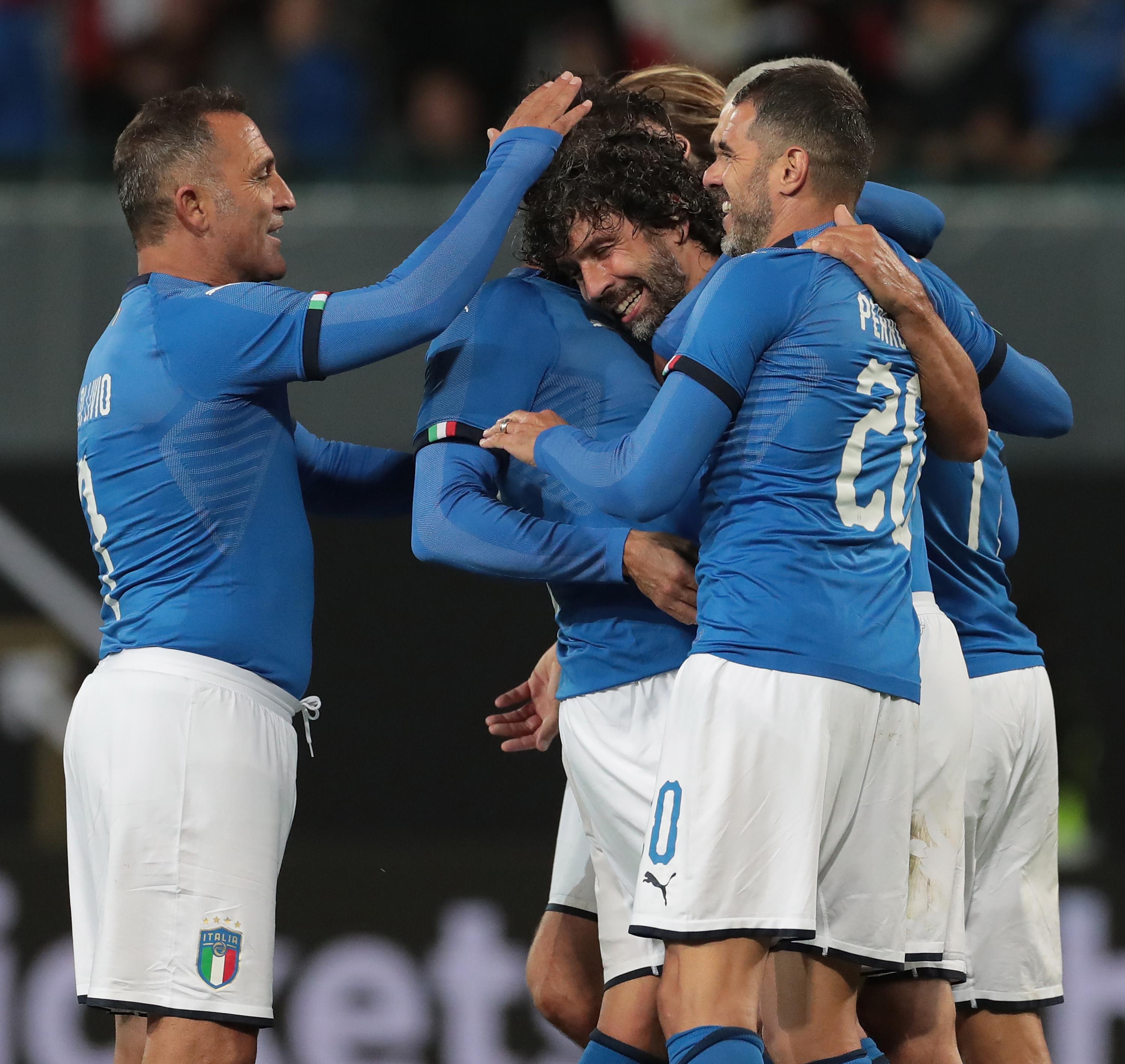 FUERTH, GERMANY - OCTOBER 07: Damiano Tommasi of Azzurri Legends celebrates his goal with his team-mates during the friendly match between DFB-All-Stars and Azzurri Legends at Sportpark Ronhof Thomas Sommer on October 7, 2019 in Fuerth, Germany. (Photo by Emilio Andreoli/Getty Images)