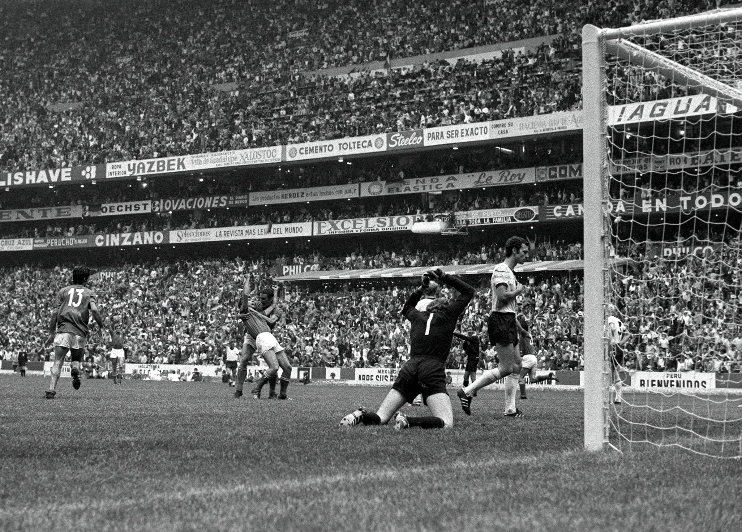 Football, 1970 World Cup Semi Final, Azteca Stadium, Mexico, 17th June 1970, Italy 4 v West Germany 3, West Germany+s goalkeeper Sepp Maier is beaten by Gianni Rivera's winning goal in extra time to settle the match, as Rivera and Riva celebrate (Photo by Popperfoto via Getty Images/Getty Images)