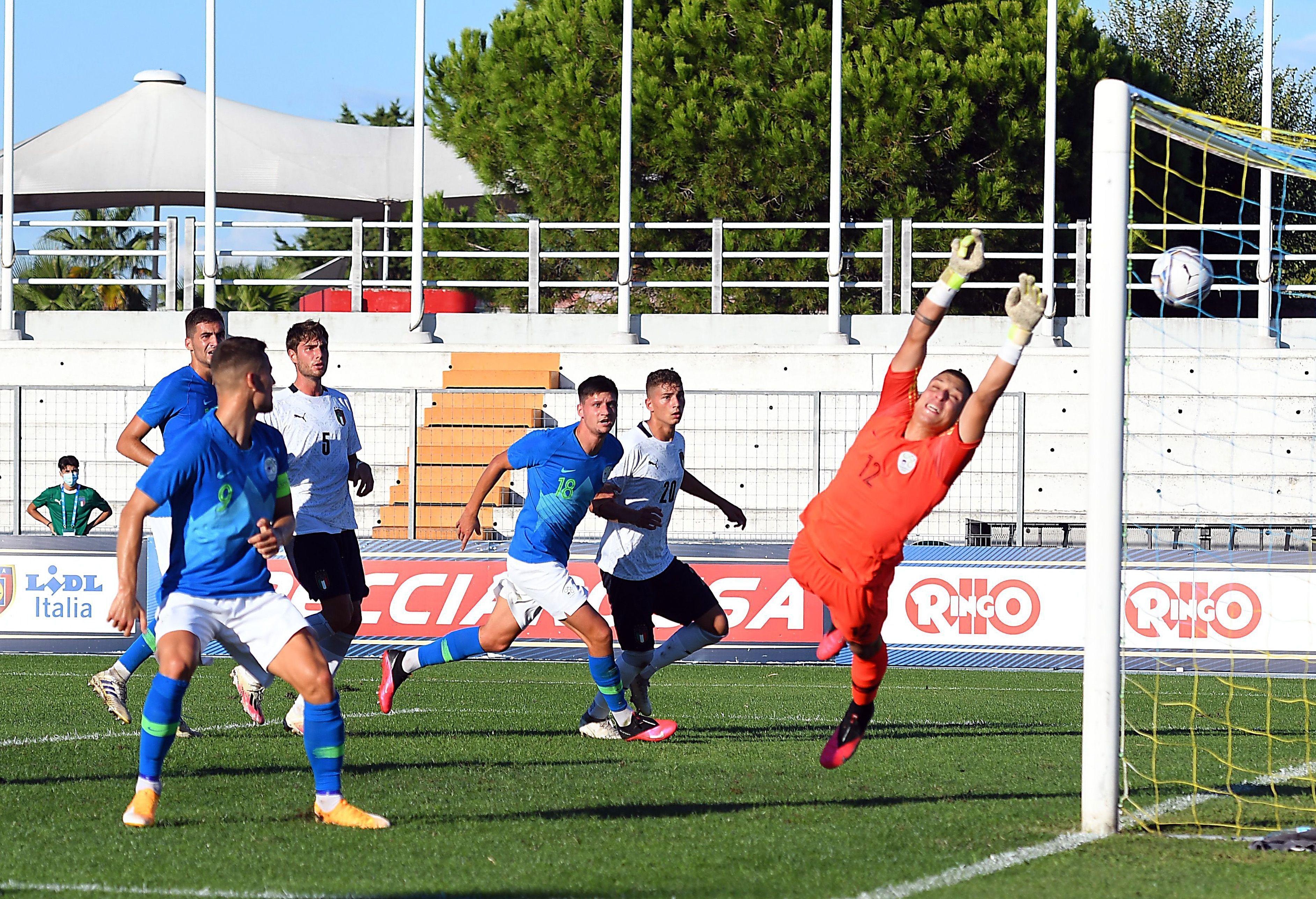 LIGNANO SABBIADORO, ITALY - SEPTEMBER 03: Andrea Colpani (obscured) of Italy U21 scores the opening goal during the International Friendly match between Italy U21 and Slovenia U21 at Stadio Guido Teghil on September 03, 2020 in Lignano Sabbiadoro, Italy. (Photo by Alessandro Sabattini/Getty Images)