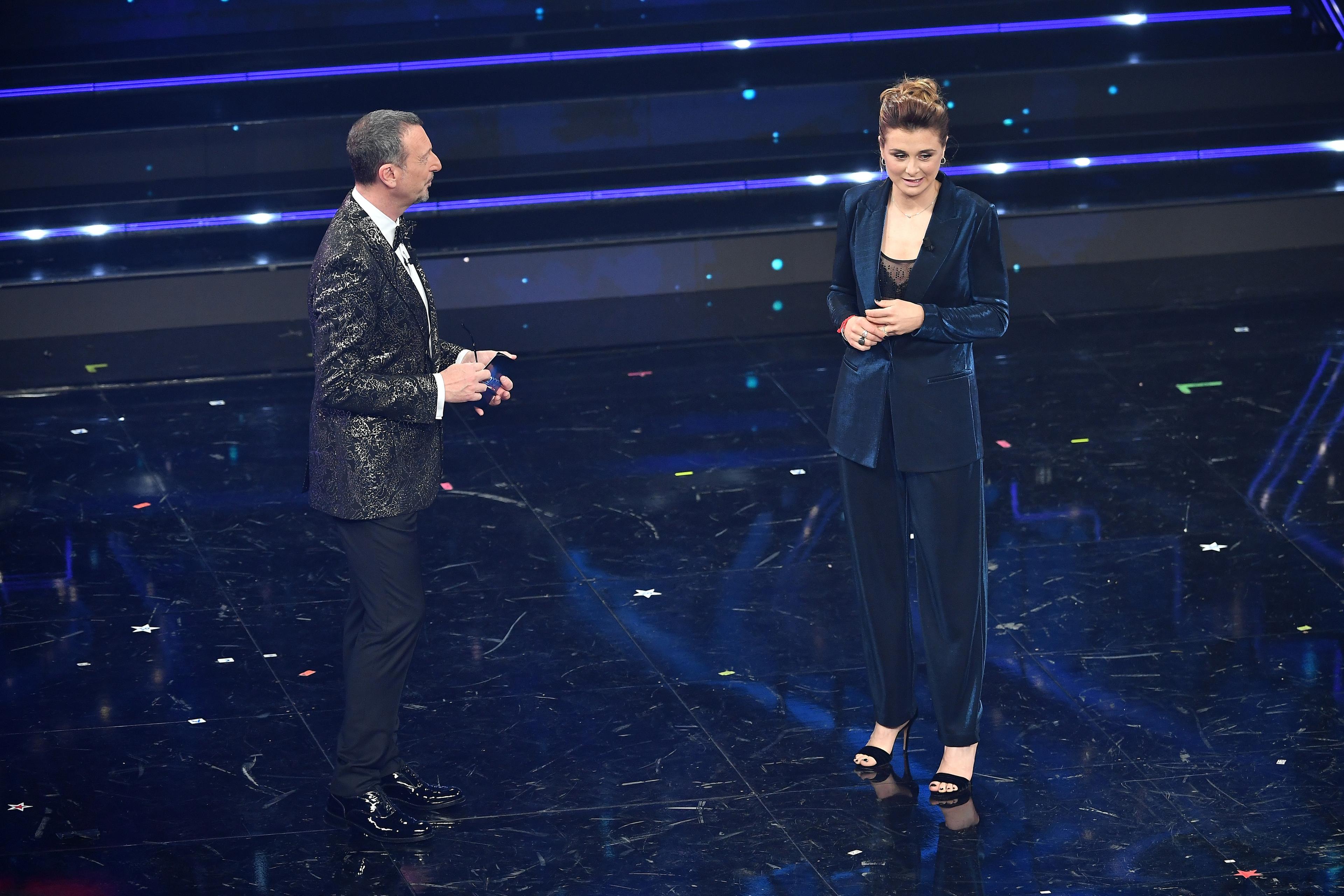 SANREMO, ITALY - MARCH 03:  Amadeus and Cristiana Girelli are seen on stage at the 71th Sanremo Music Festival 2021 at Teatro Ariston on March 03, 2021 in Sanremo, Italy. (Photo by Jacopo M. Raule/Getty Images)