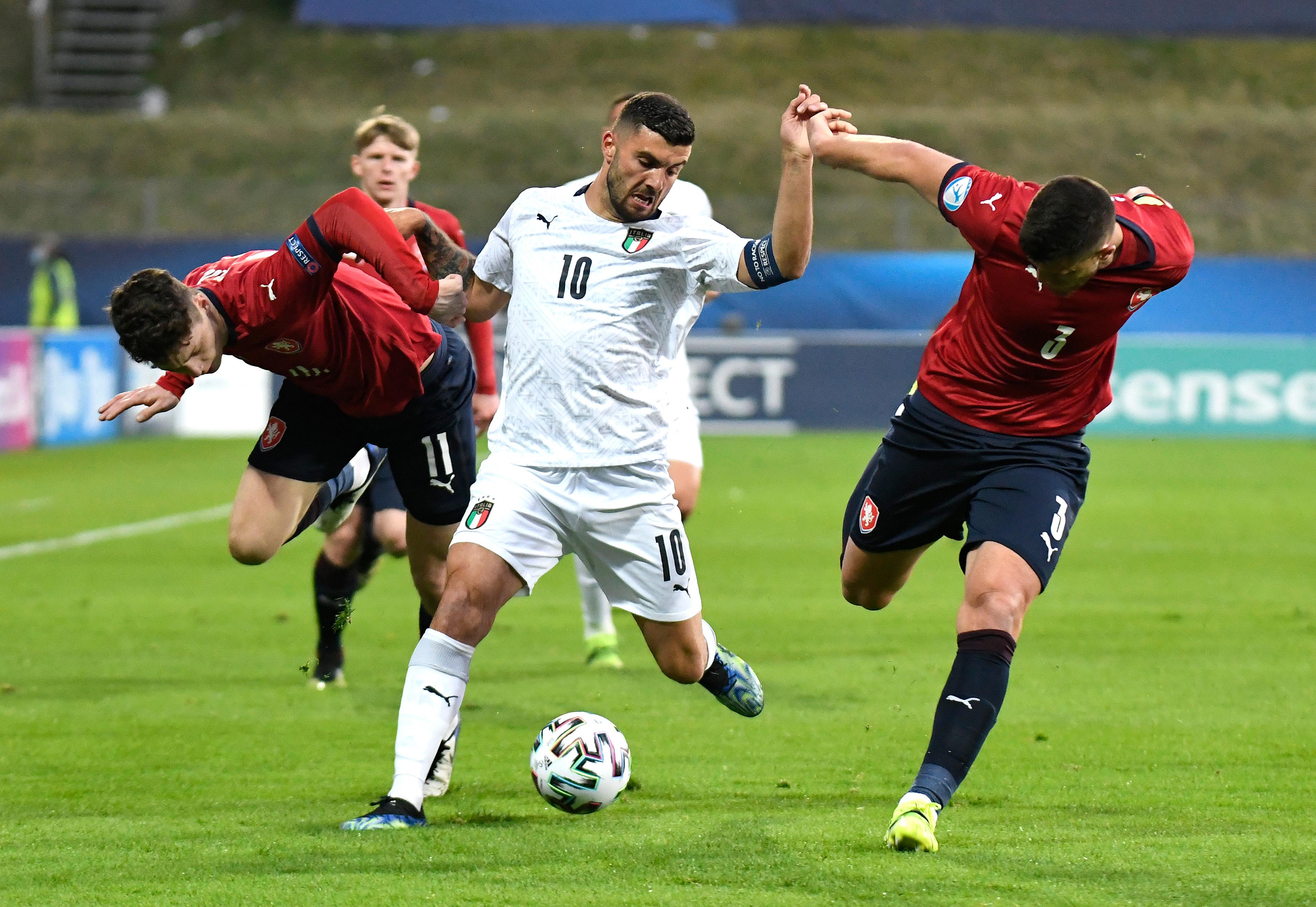 CELJE, SLOVENIA - MARCH 24: Patrick Cutrone of Italy battles for possession with Ladislav Krejci and Matej Chalus of Czech Republic during the 2021 UEFA European Under-21 Championship Group B match between Czech Republic and Italy at Stadion Celje on March 24, 2021 in Celje, Slovenia. Sporting stadiums around Slovenia remain under strict restrictions due to the Coronavirus Pandemic as Government social distancing laws prohibit fans inside venues resulting in games being played behind closed doors. (Photo by Jurij Kodrun/Getty Images)