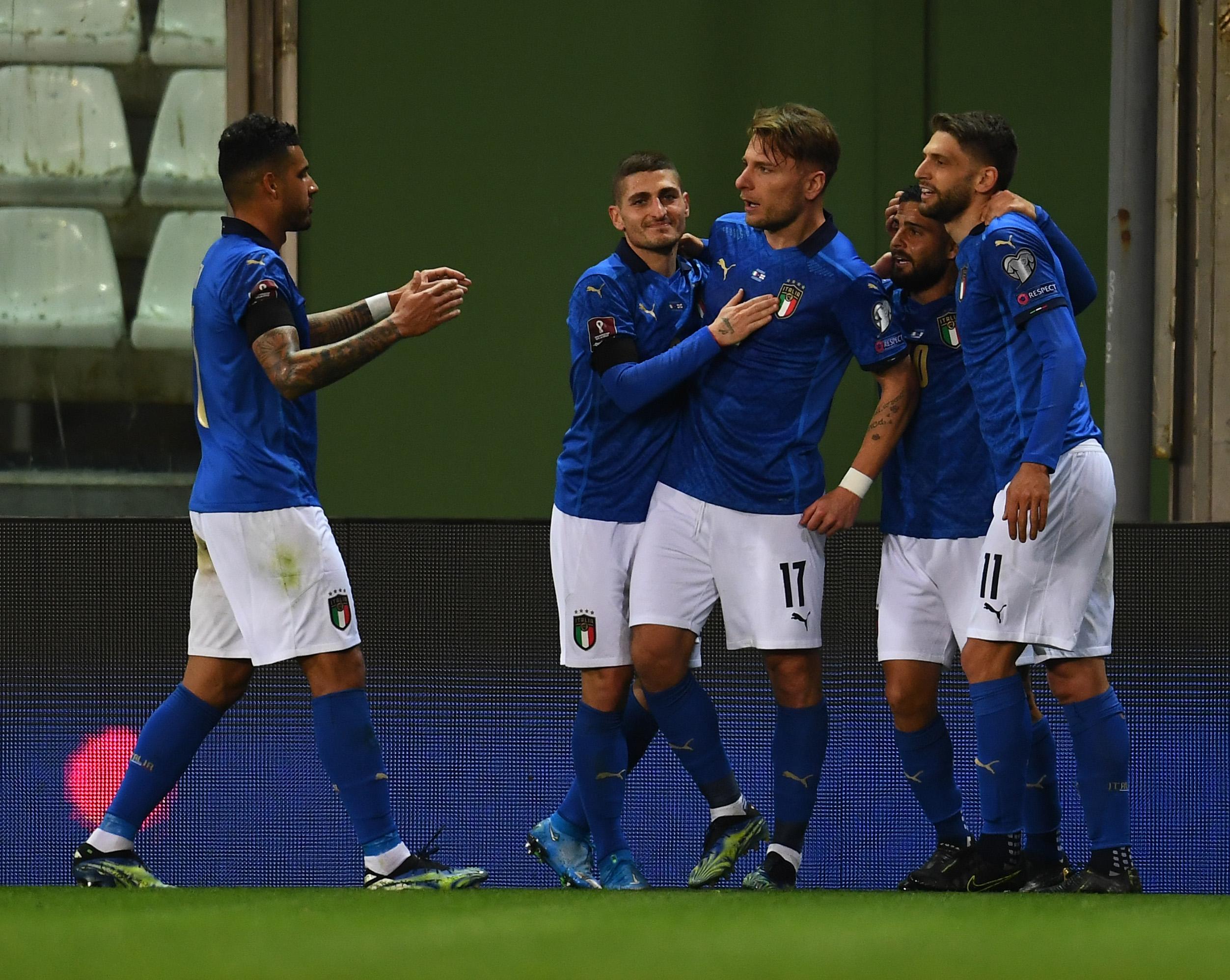 PARMA, ITALY - MARCH 25: Ciro Immobile of Italy celebrates with team-mates after scoring the second goal during the FIFA World Cup 2022 Qatar qualifying match between Italy and Northern Ireland on March 25, 2021 in Parma, Italy. Sporting stadiums around Italy remain under strict restrictions due to the Coronavirus Pandemic as Government social distancing laws prohibit fans inside venues resulting in games being played behind closed doors. (Photo by Claudio Villa/Getty Images)