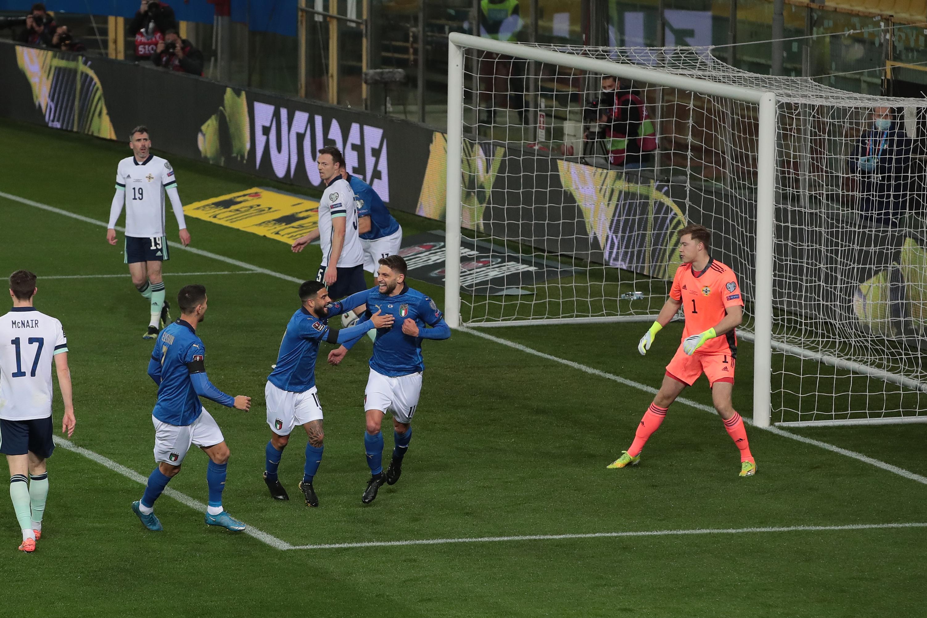 PARMA, ITALY - MARCH 25:  Domenico Berardi of Italy celebrates with his team-mates after scoring the opening goal - Led Puma - during the FIFA World Cup 2022 Qatar qualifying match between Italy and Northern Ireland on March 25, 2021 in Parma, Italy. (Photo by Emilio Andreoli/Getty Images)